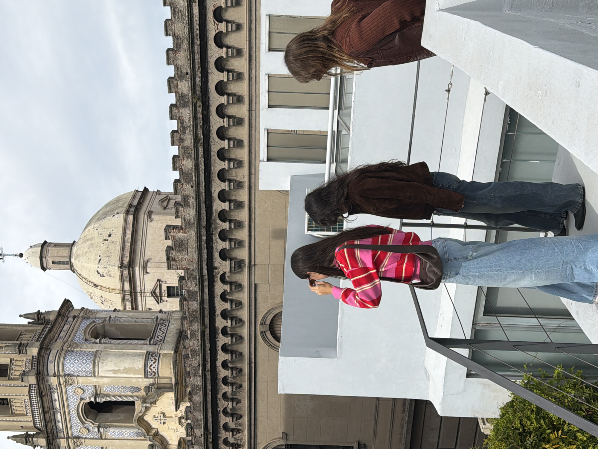 Casual Buenos Aires moments: rooftop photography, patio gardening, door inspection