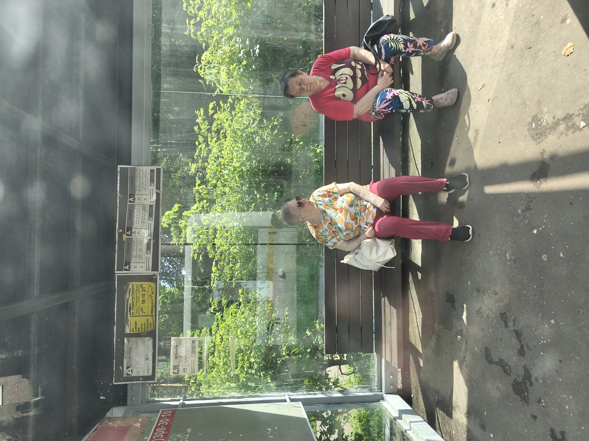 Quiet morning at a Zhukovsky bus stop near a medical facility