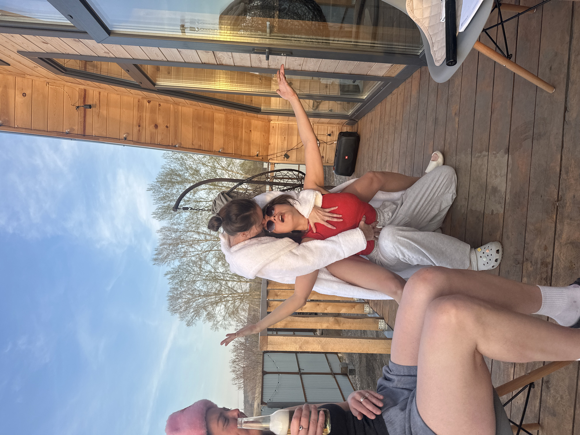 Young women gather, dance on wooden deck in Krasnoyarsk