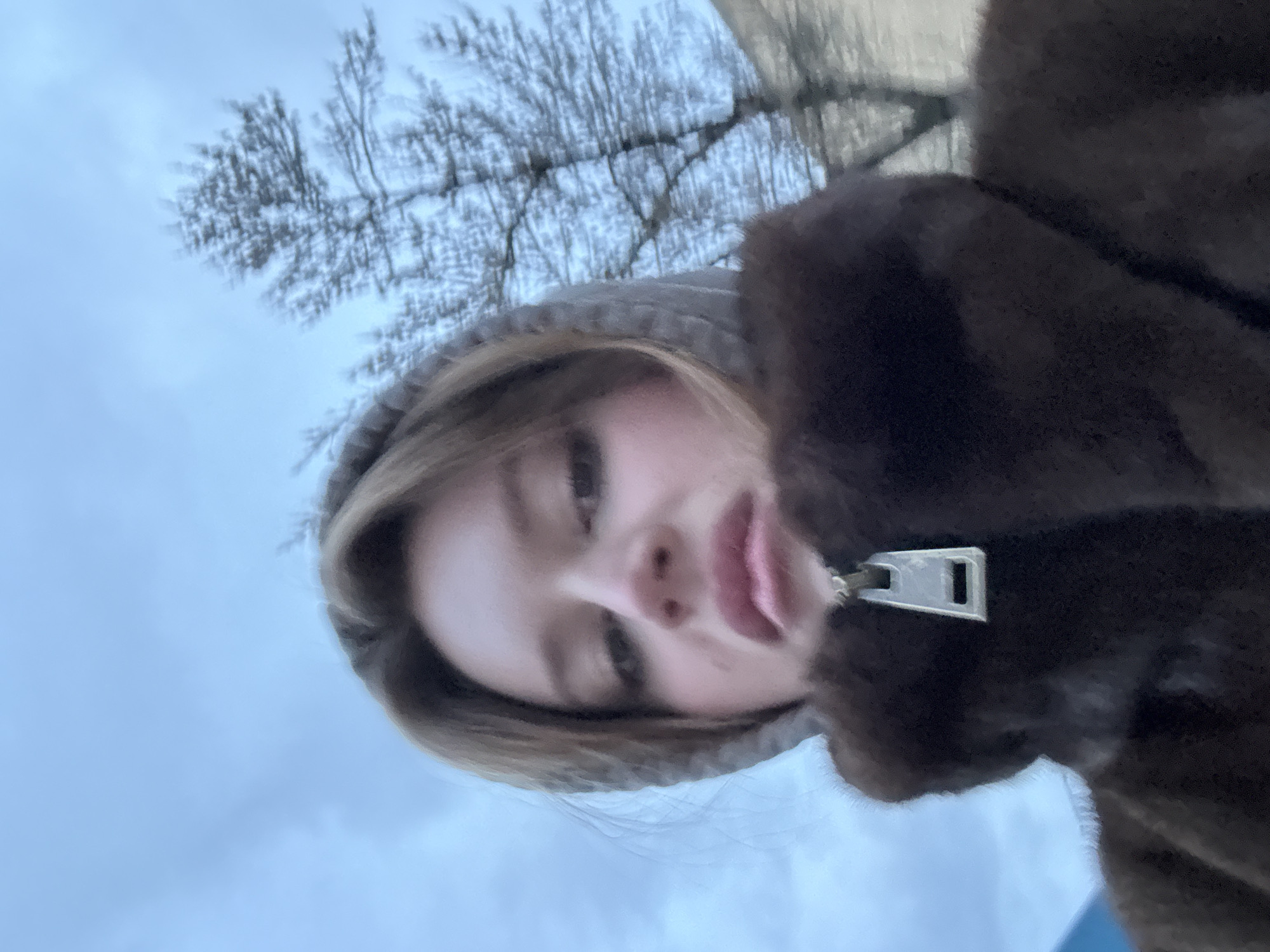 Person takes selfie outdoors in Hrodna during spring
