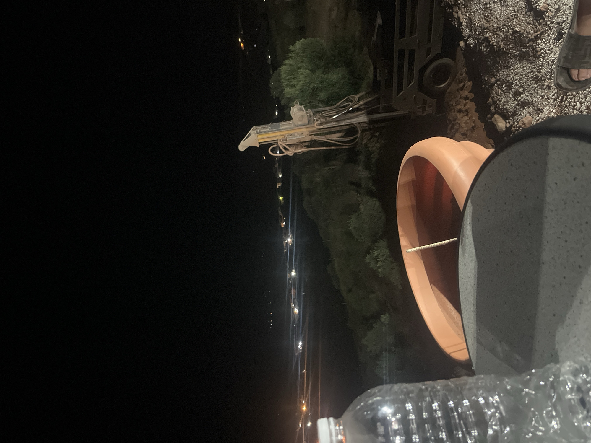 Fuel truck delivers to illuminated gas station in Morocco