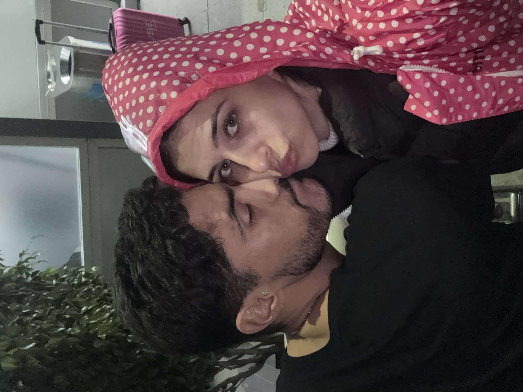 Couple poses for photo in New Delhi evening
