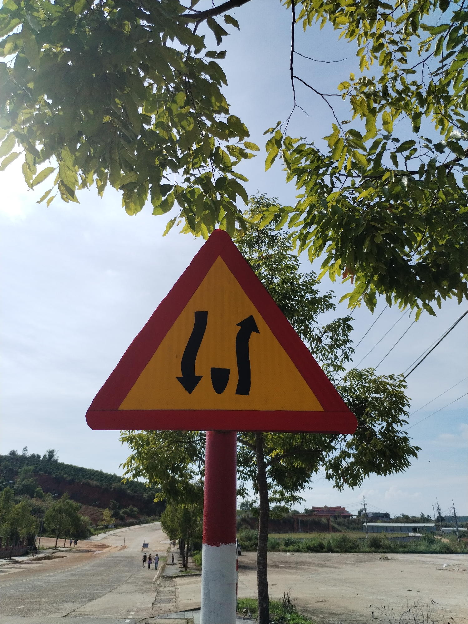 Witness documents rural road infrastructure in Bo Y, Vietnam