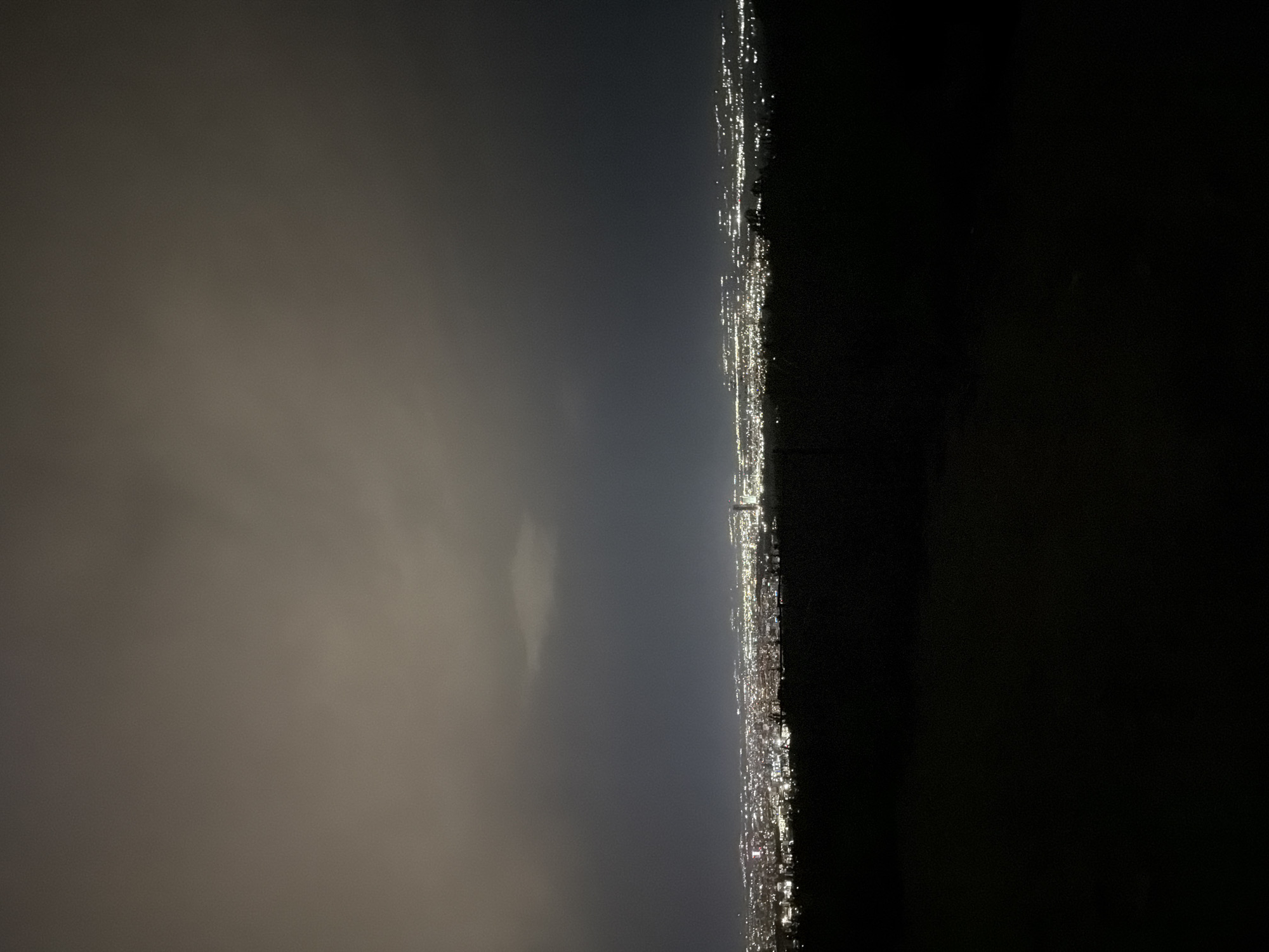 Nighttime city lights from a hilltop above Bistritsa