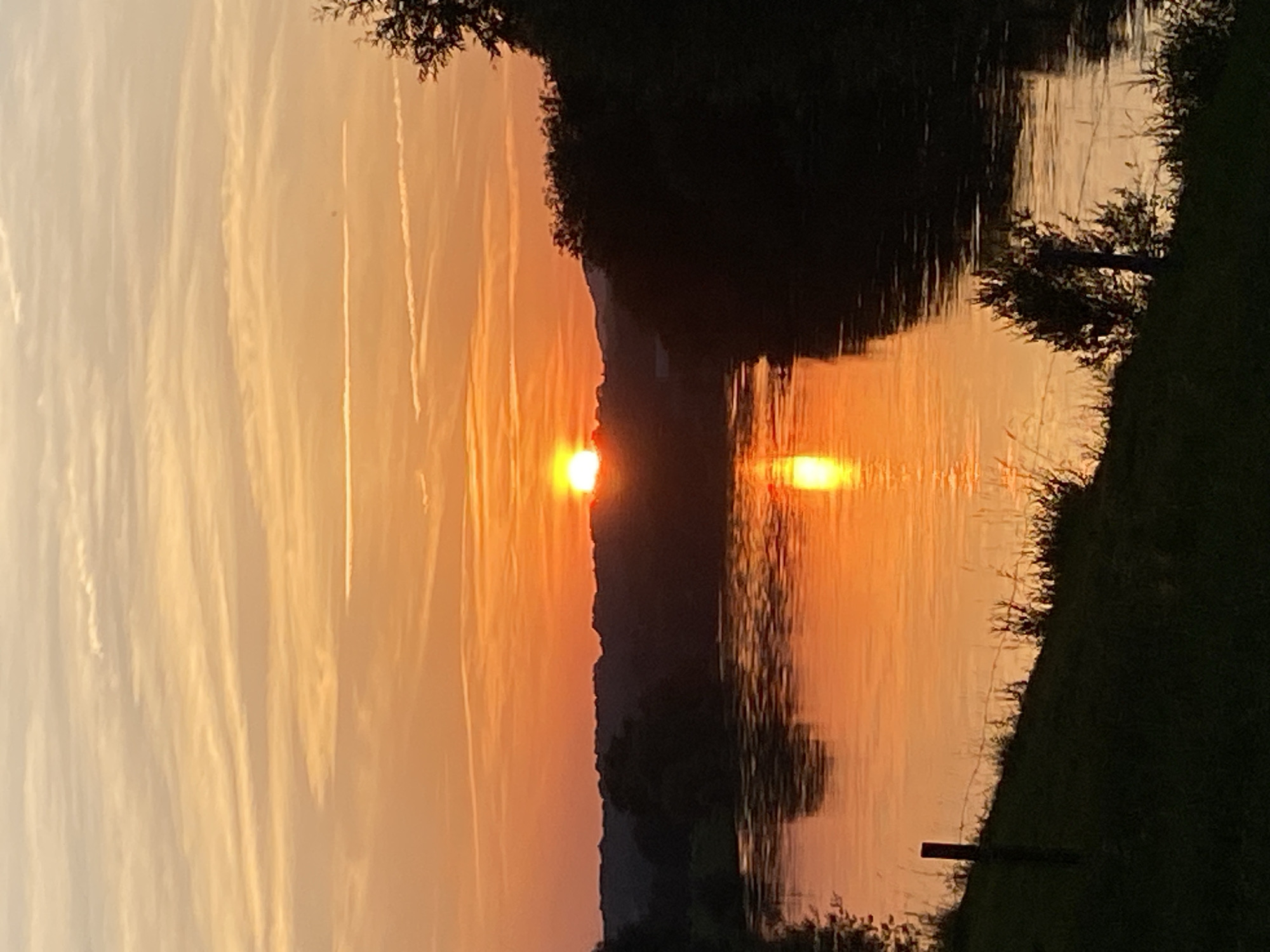 Golden sunset reflects off a river in Rinteln