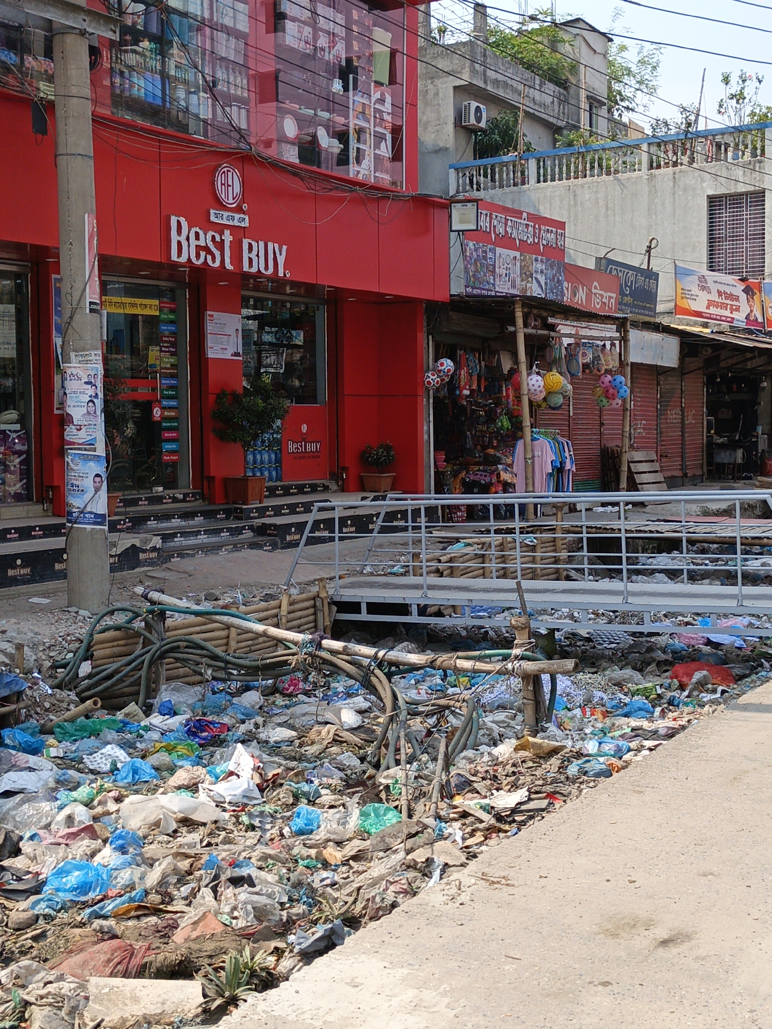 Garbage-filled drainage ditch observed in Dhaka street