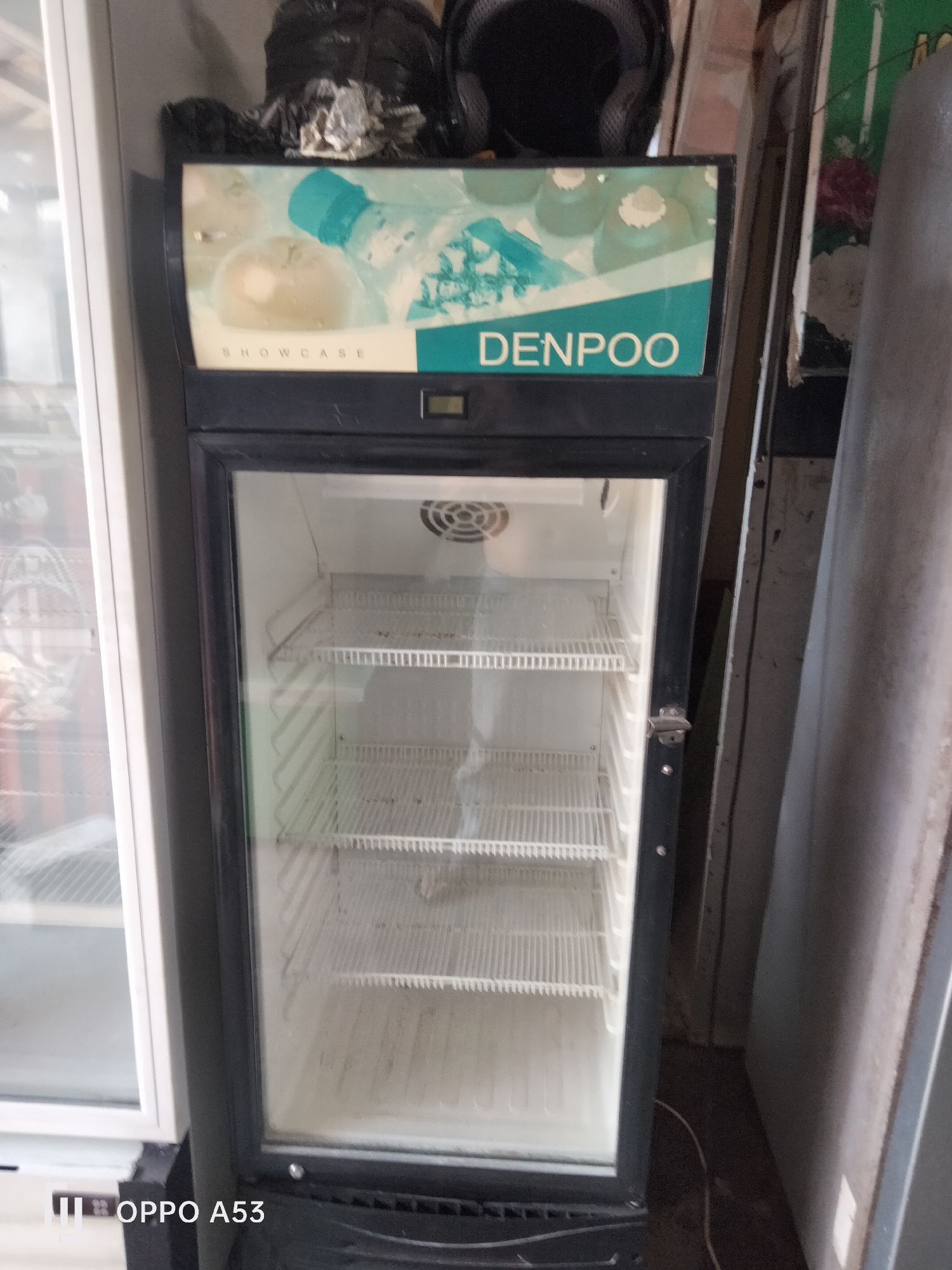 Inside a Denpasar secondhand appliance and electronics shop