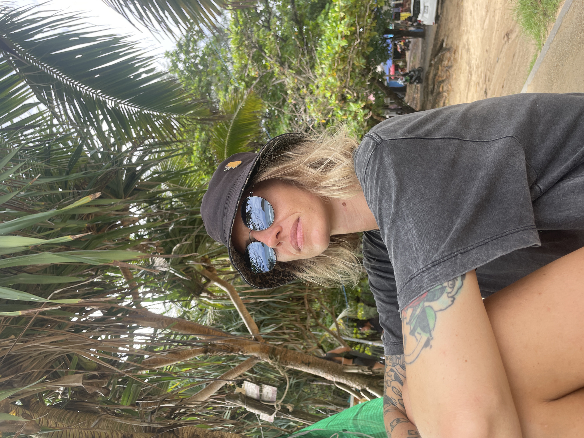 Lazy morning at a Rawai beach spot, surf rescue board nearby