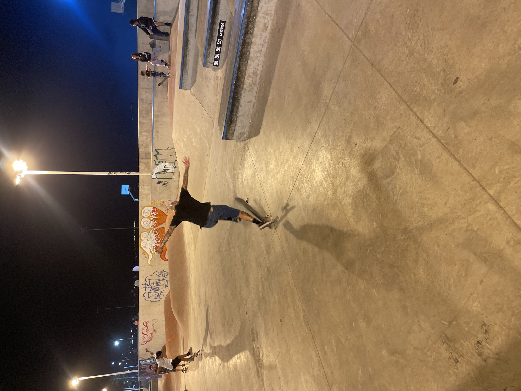 Late night skateboarding and fountain activity in Iquique, Chile