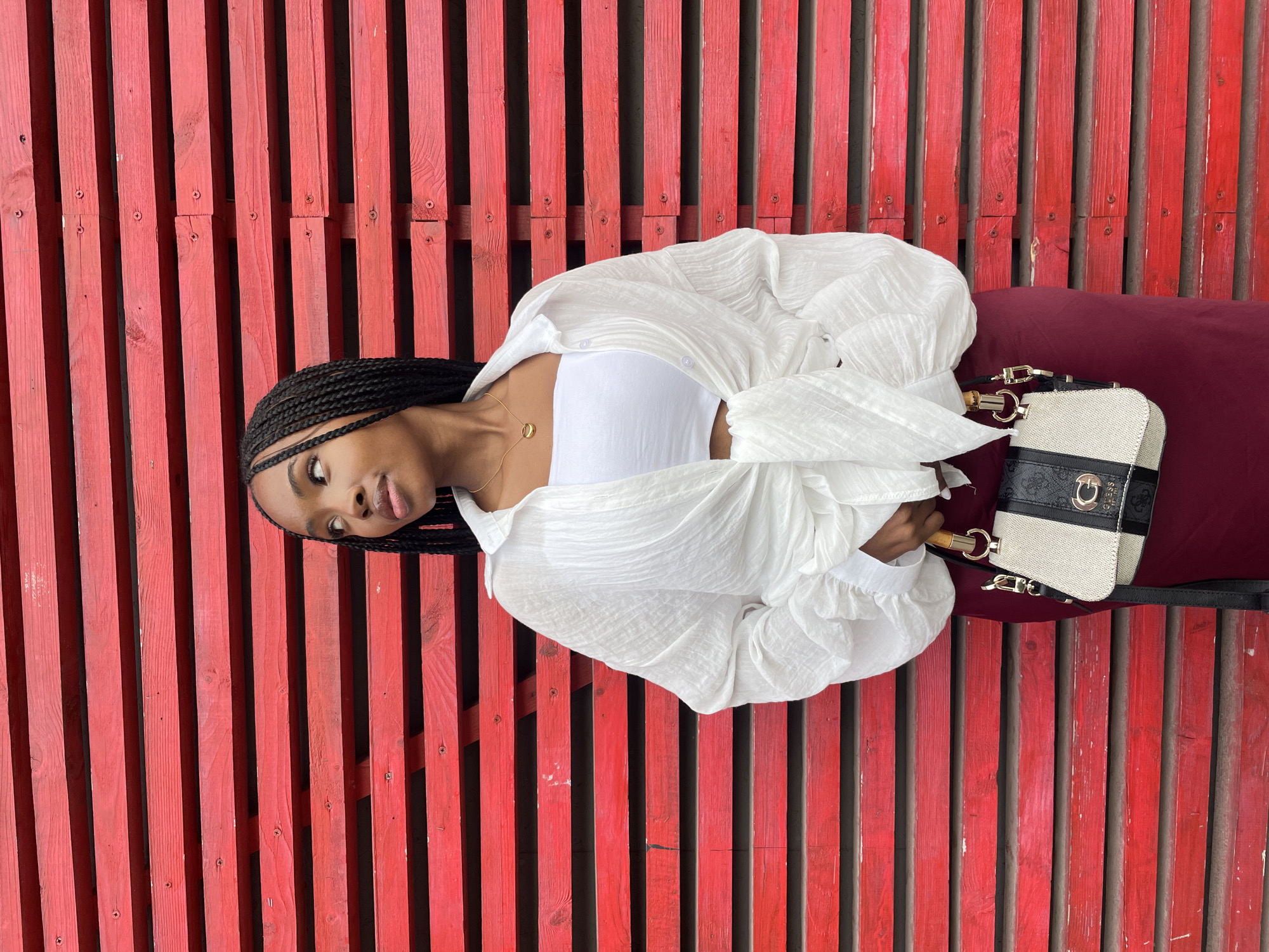 Photo session captured in Kazan featuring woman in white outfit