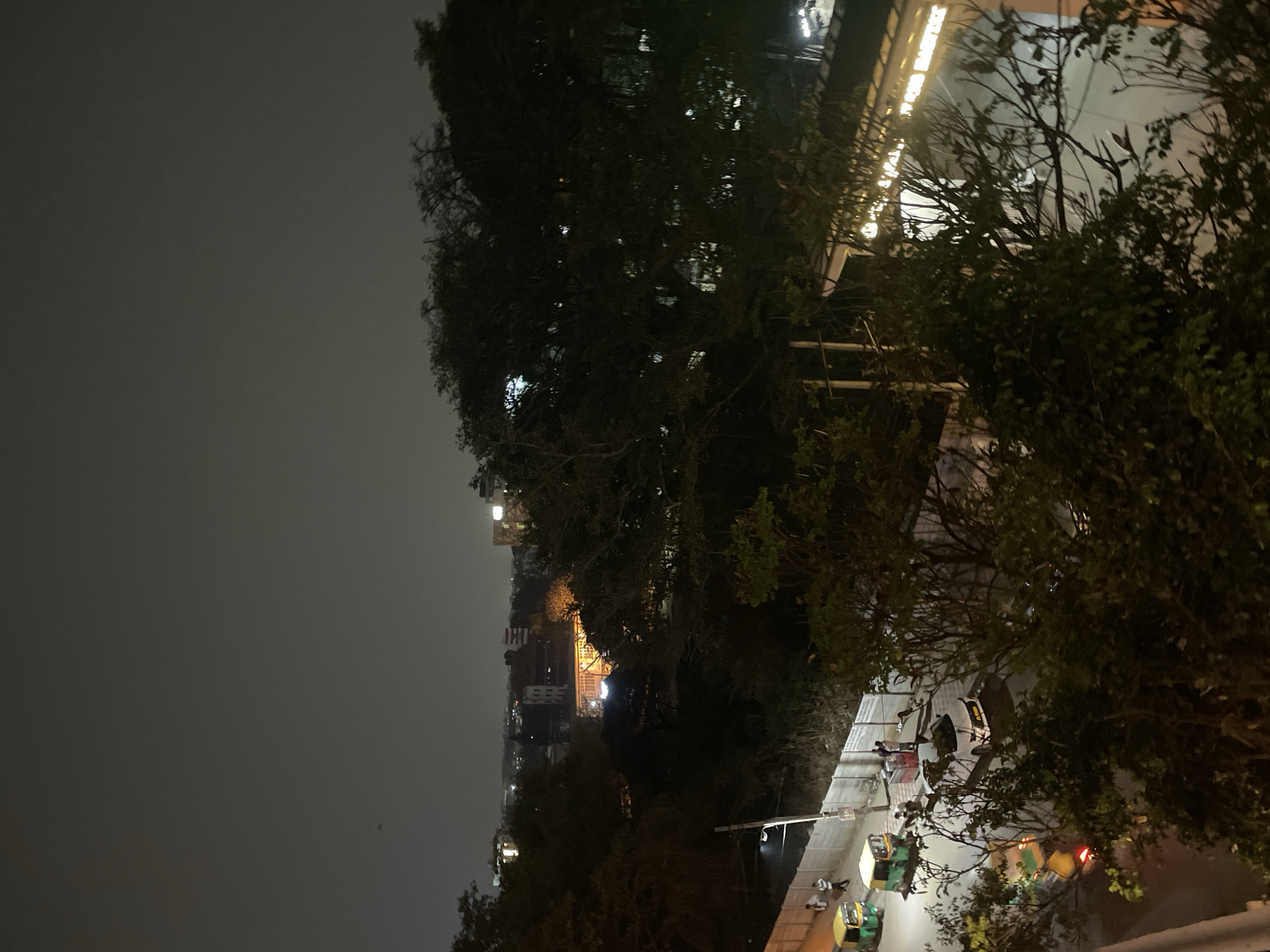 Nighttime urban scenes documented across Bengaluru streets and highways