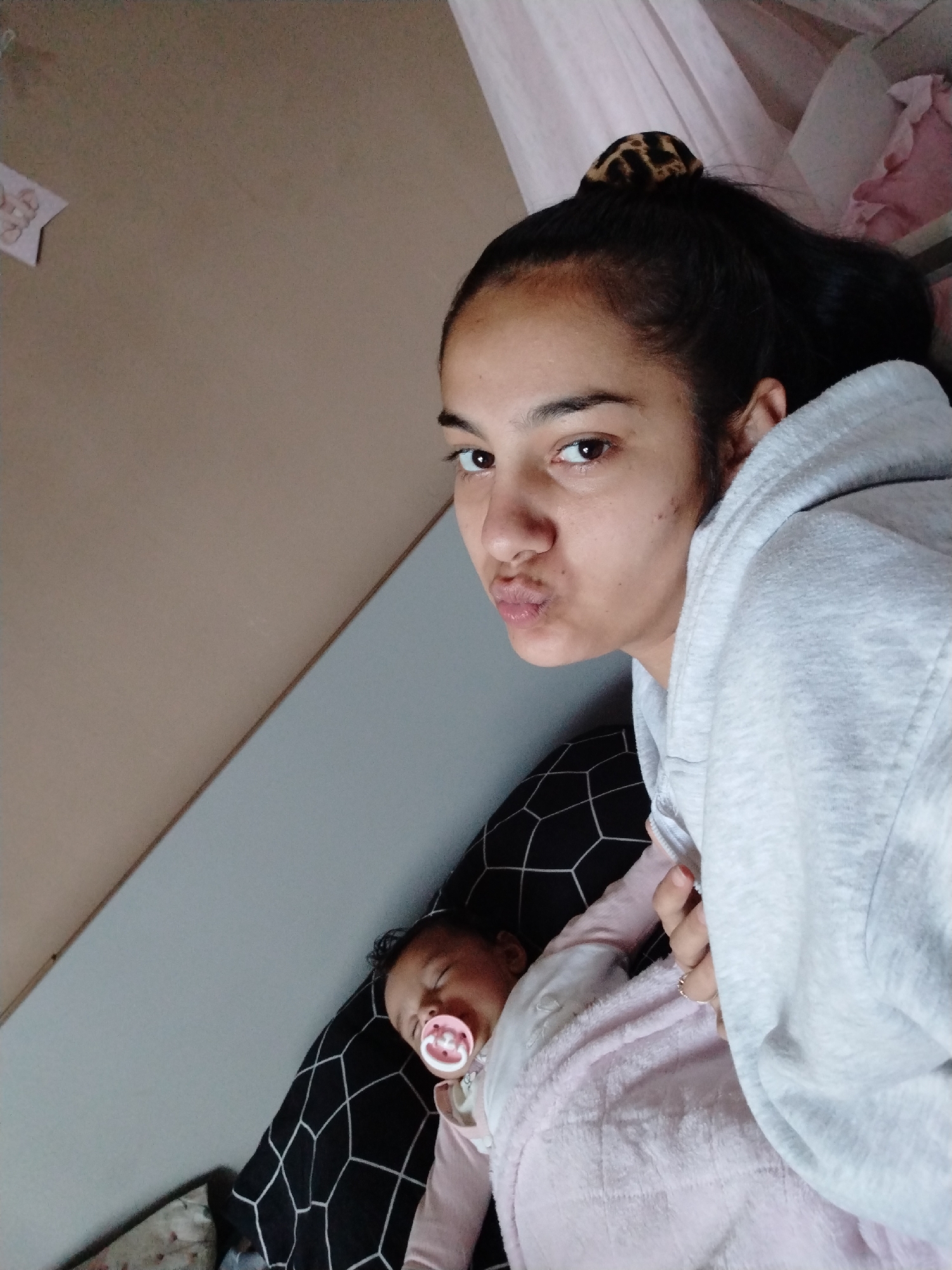 Early morning domestic moments: woman, baby, and Mercedes-Benz documented