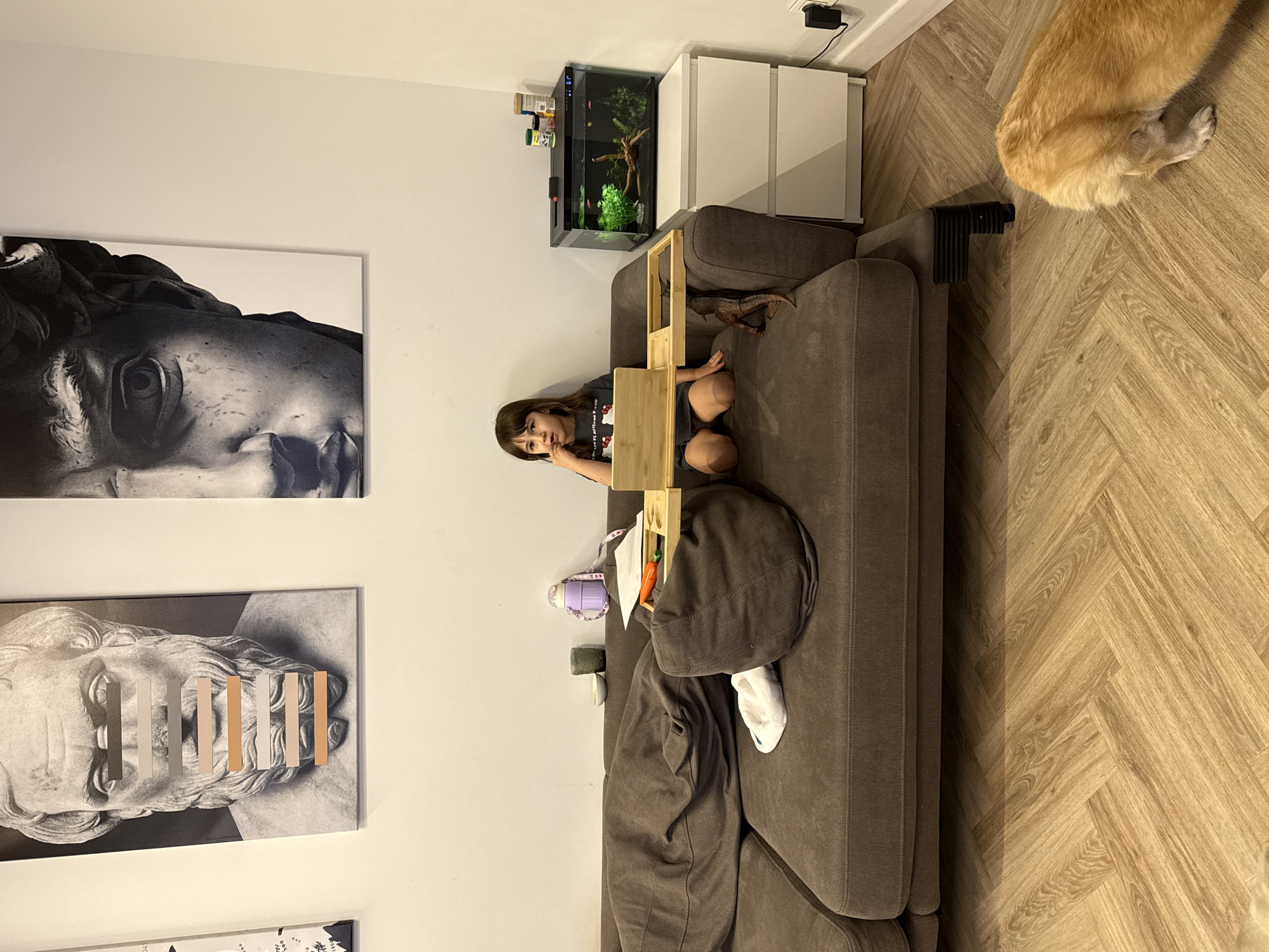 Family moments captured in Krasnoyarsk home with girl, pet