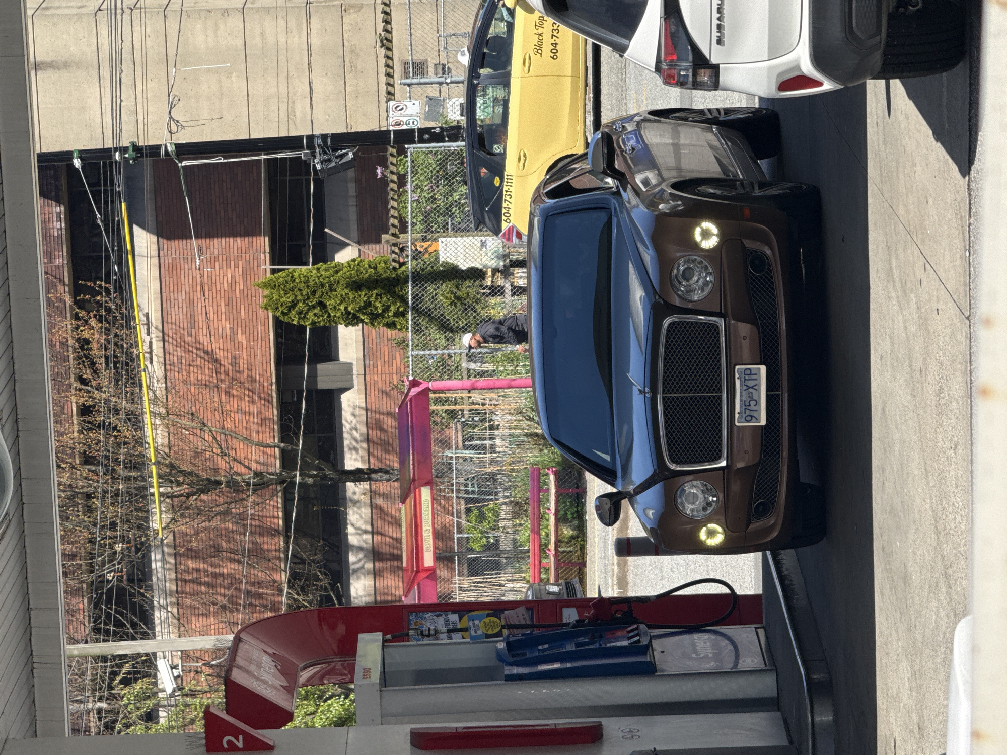 Evening traffic observed at Vancouver intersection and gas station