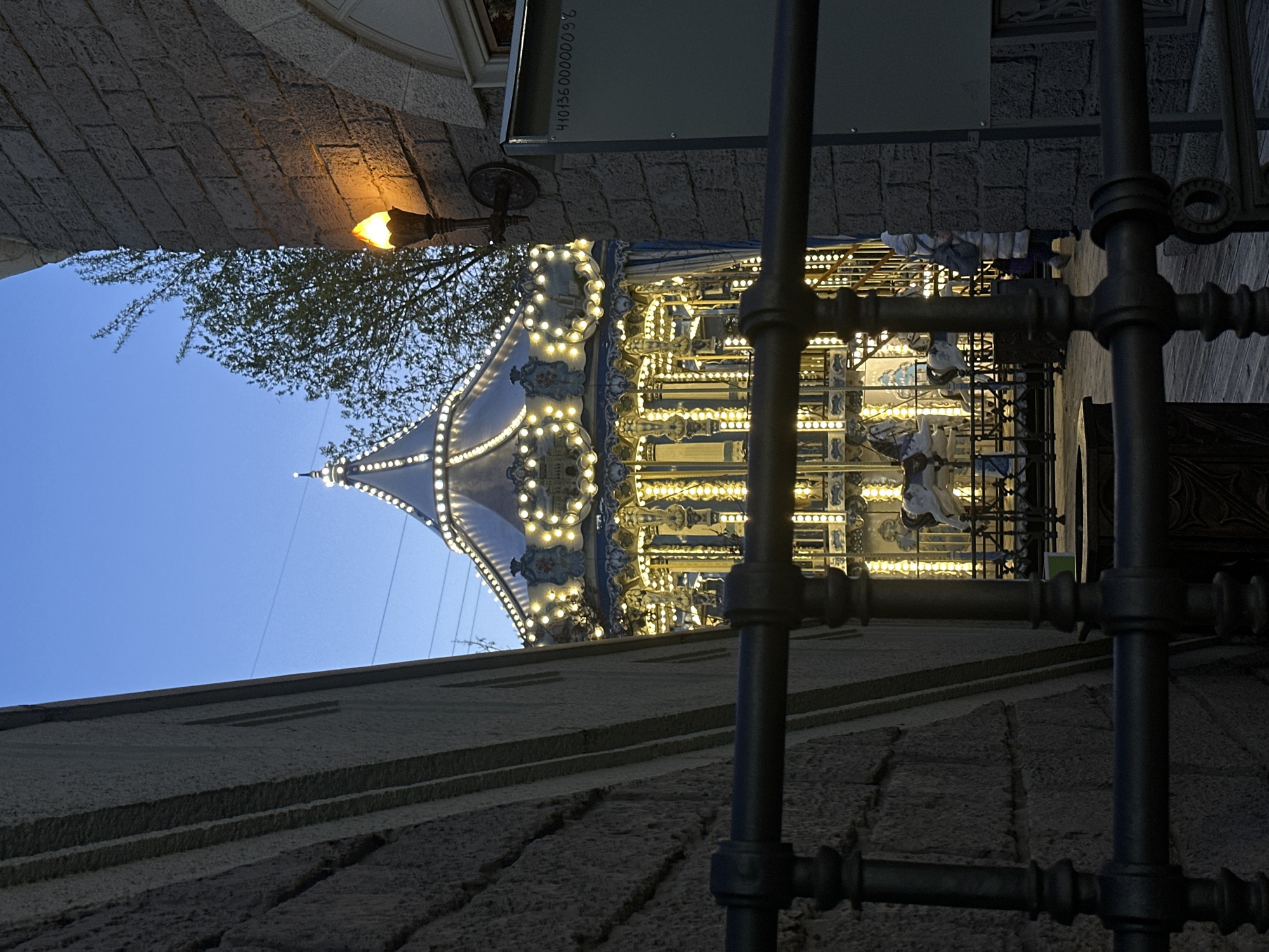 Evening carousel rides captured in Moscow's architectural district