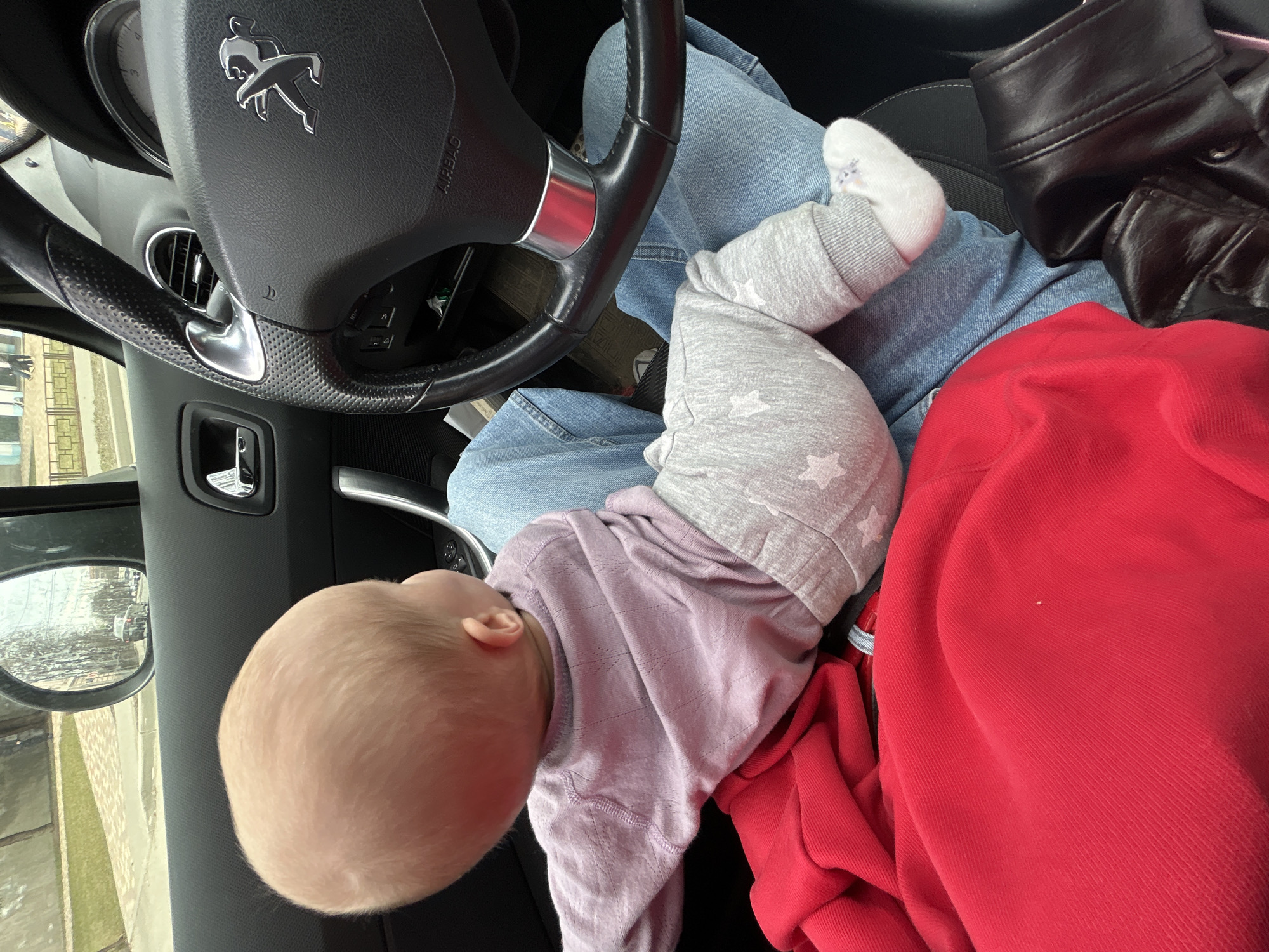 Unrestrained baby observed near steering wheel in Moscow car