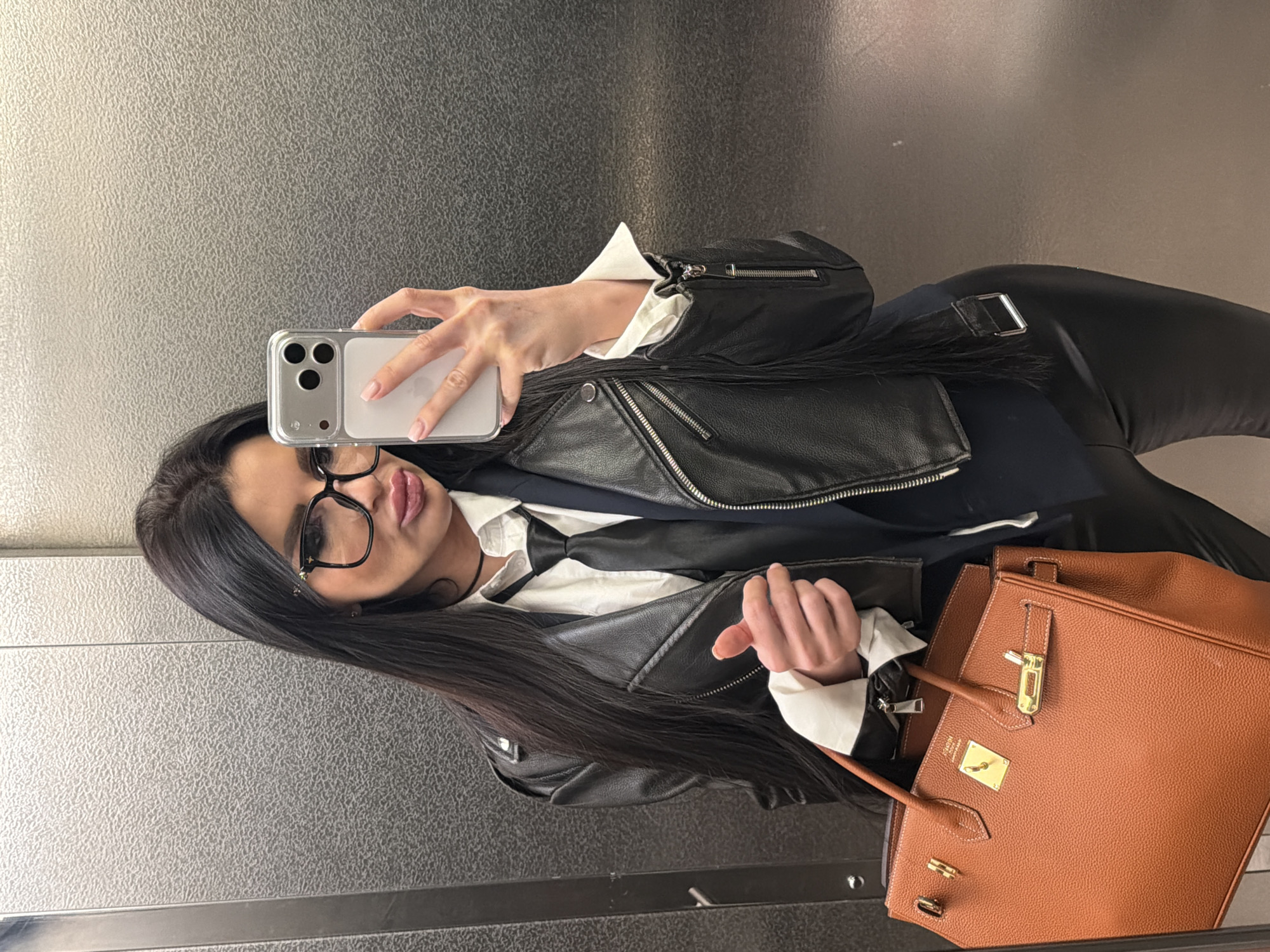 Woman takes elevator selfie amid overcast day in Voronezh