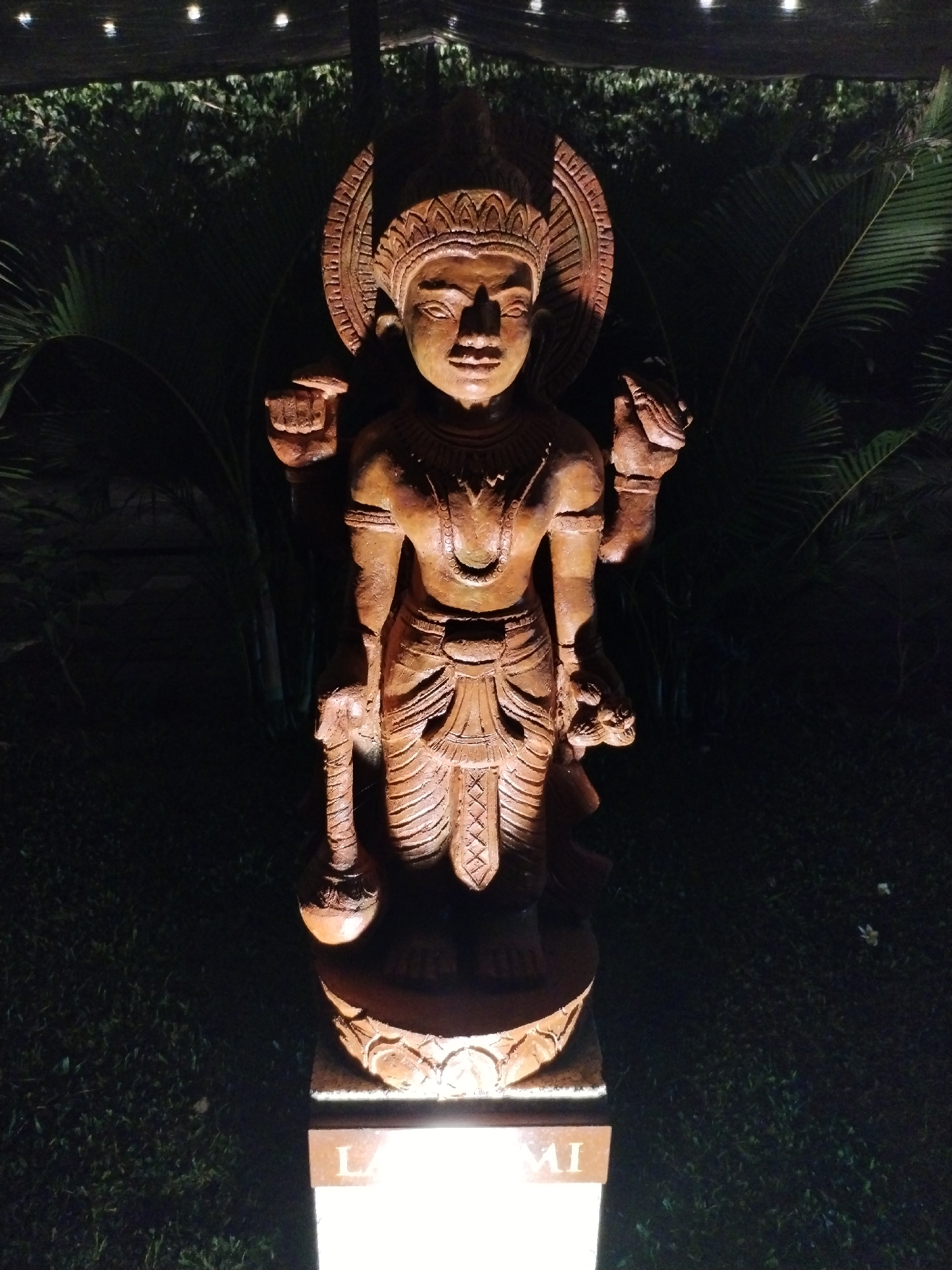 Nighttime religious statues and temple illumination documented in Nha Trang