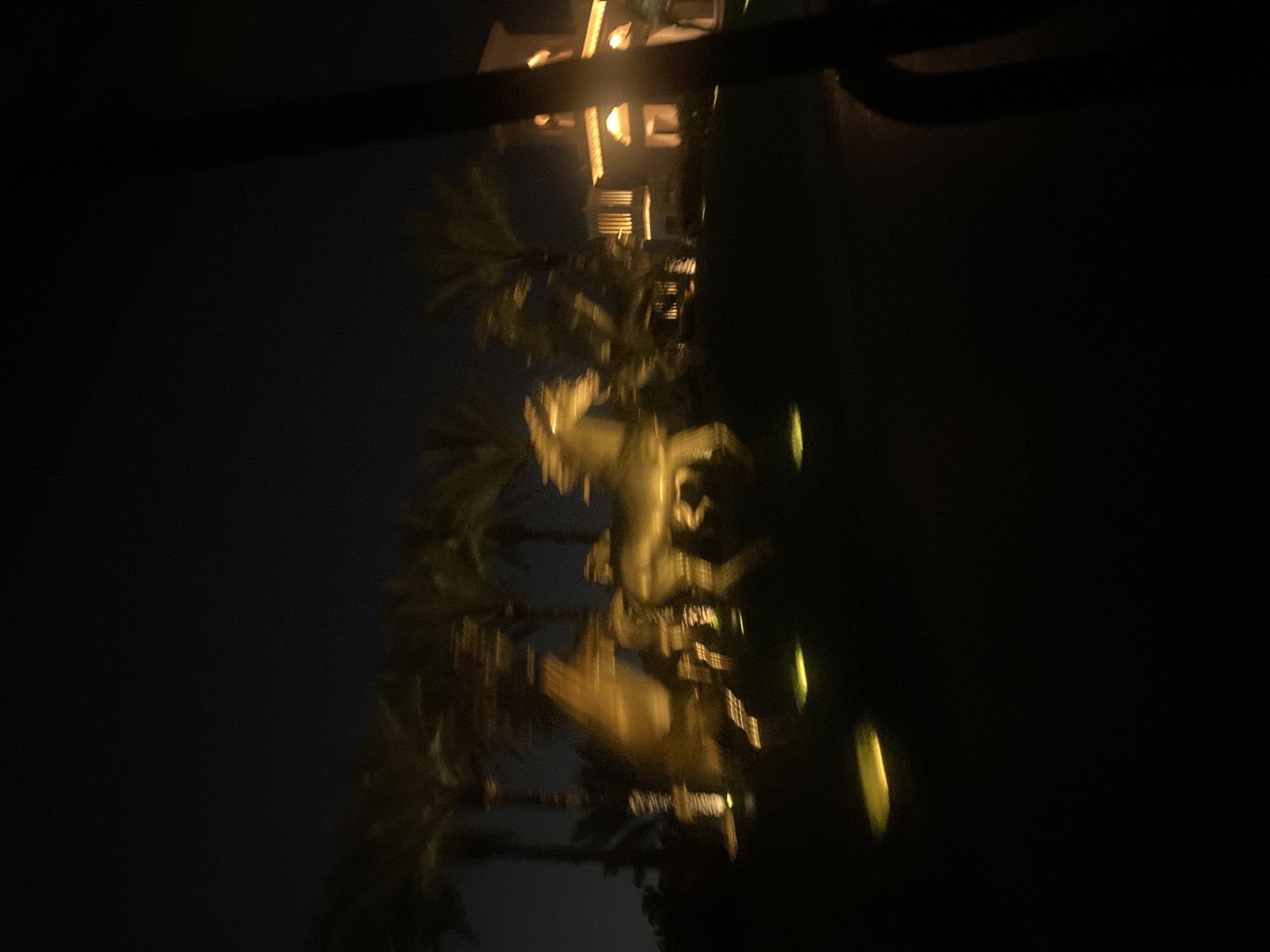 Nighttime Dubai scenes captured featuring illuminated architecture and fountain