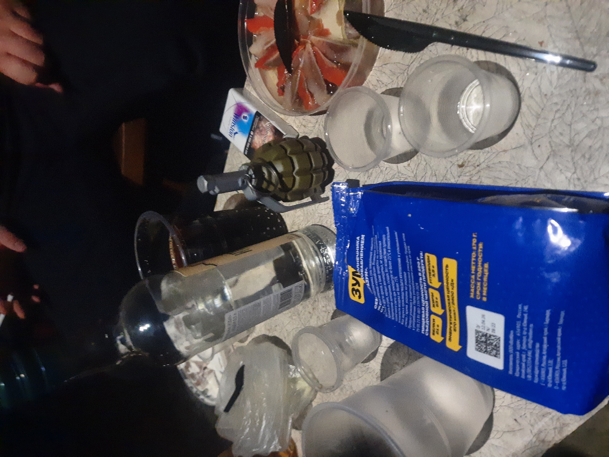 Post-gathering scene documented with mixed civilian and military items