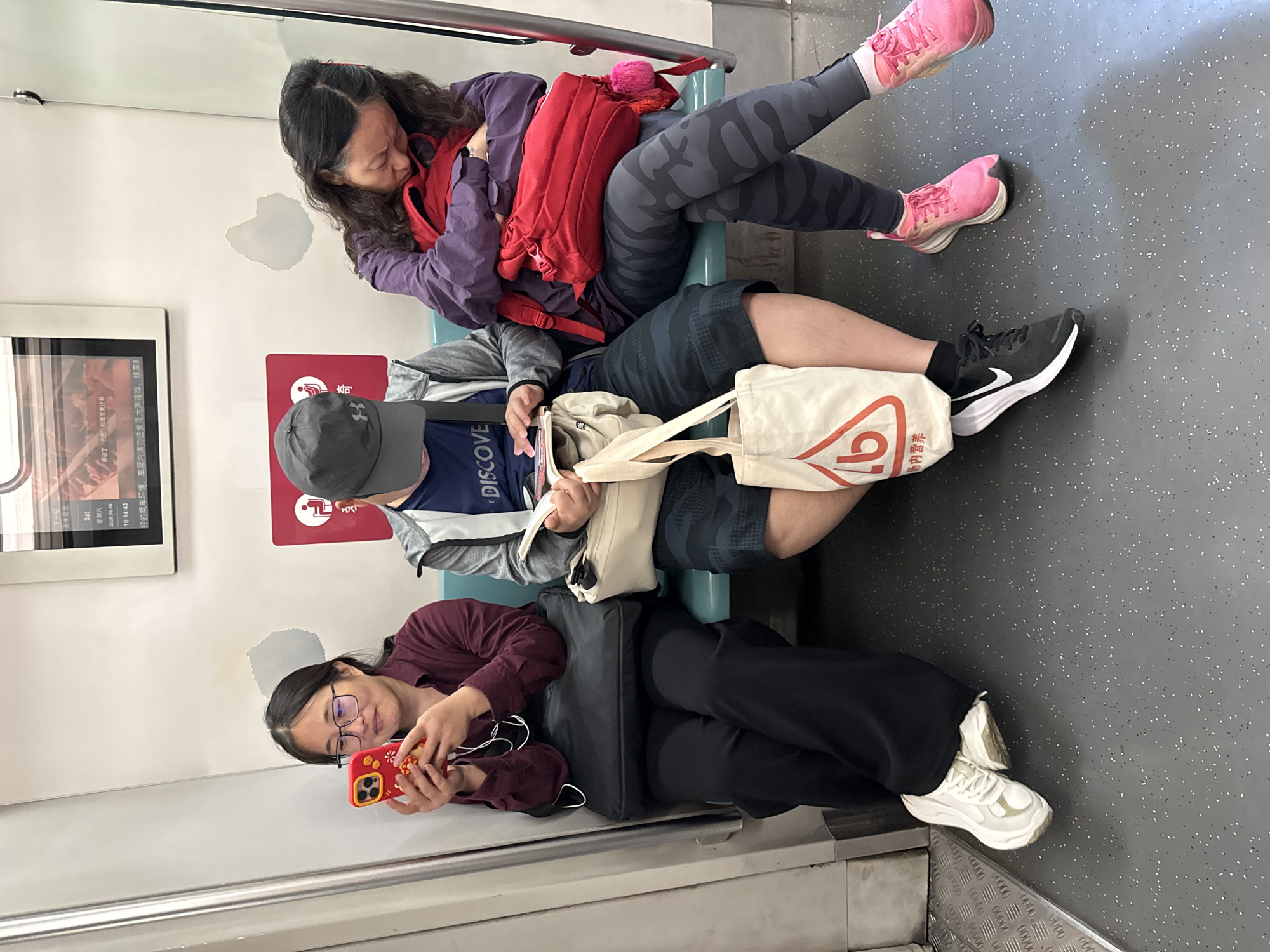 Morning commuters ride Beijing subway toward Gaomidian North station