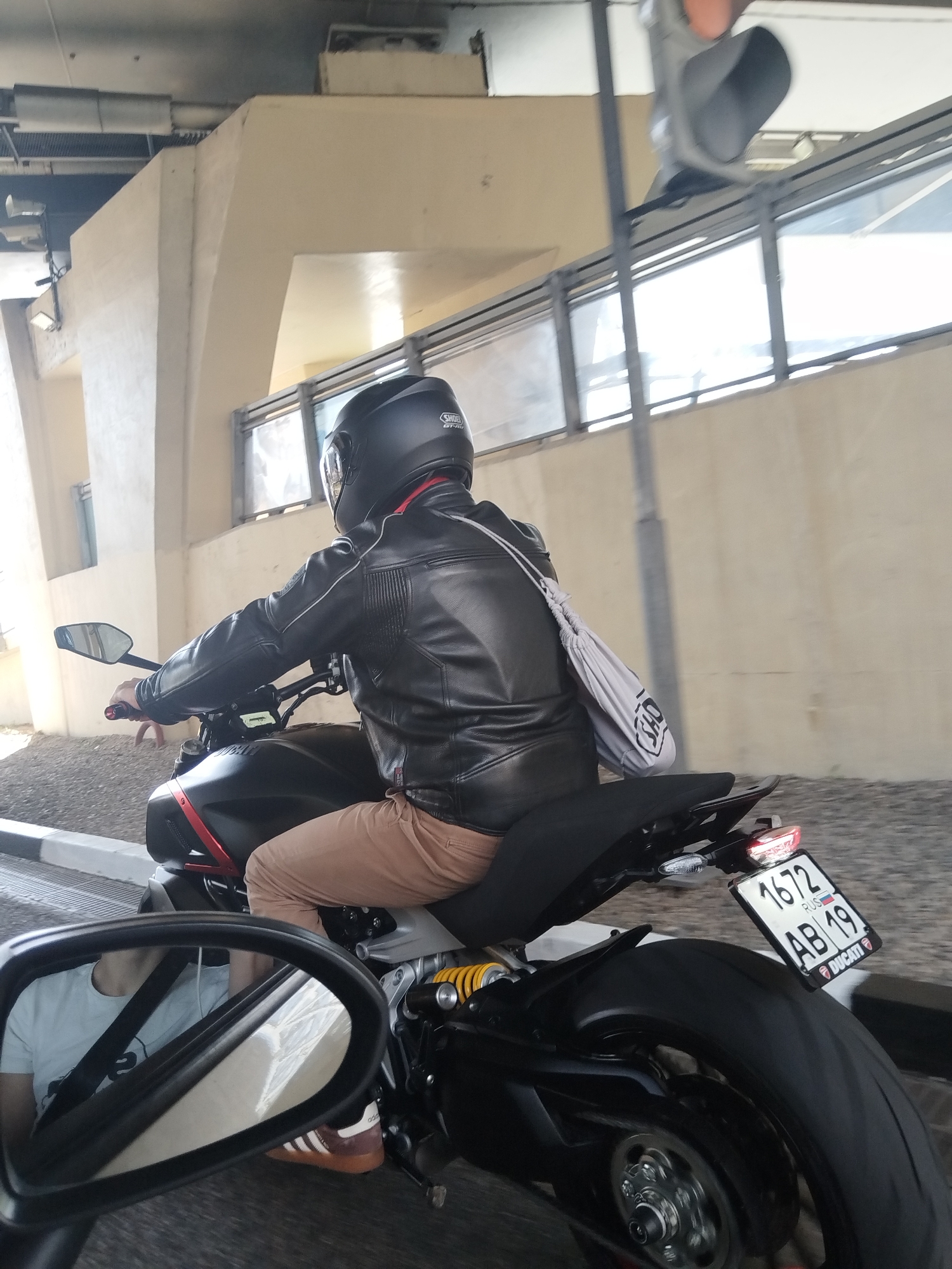 Ducati rider spotted on Sochi road through side mirror