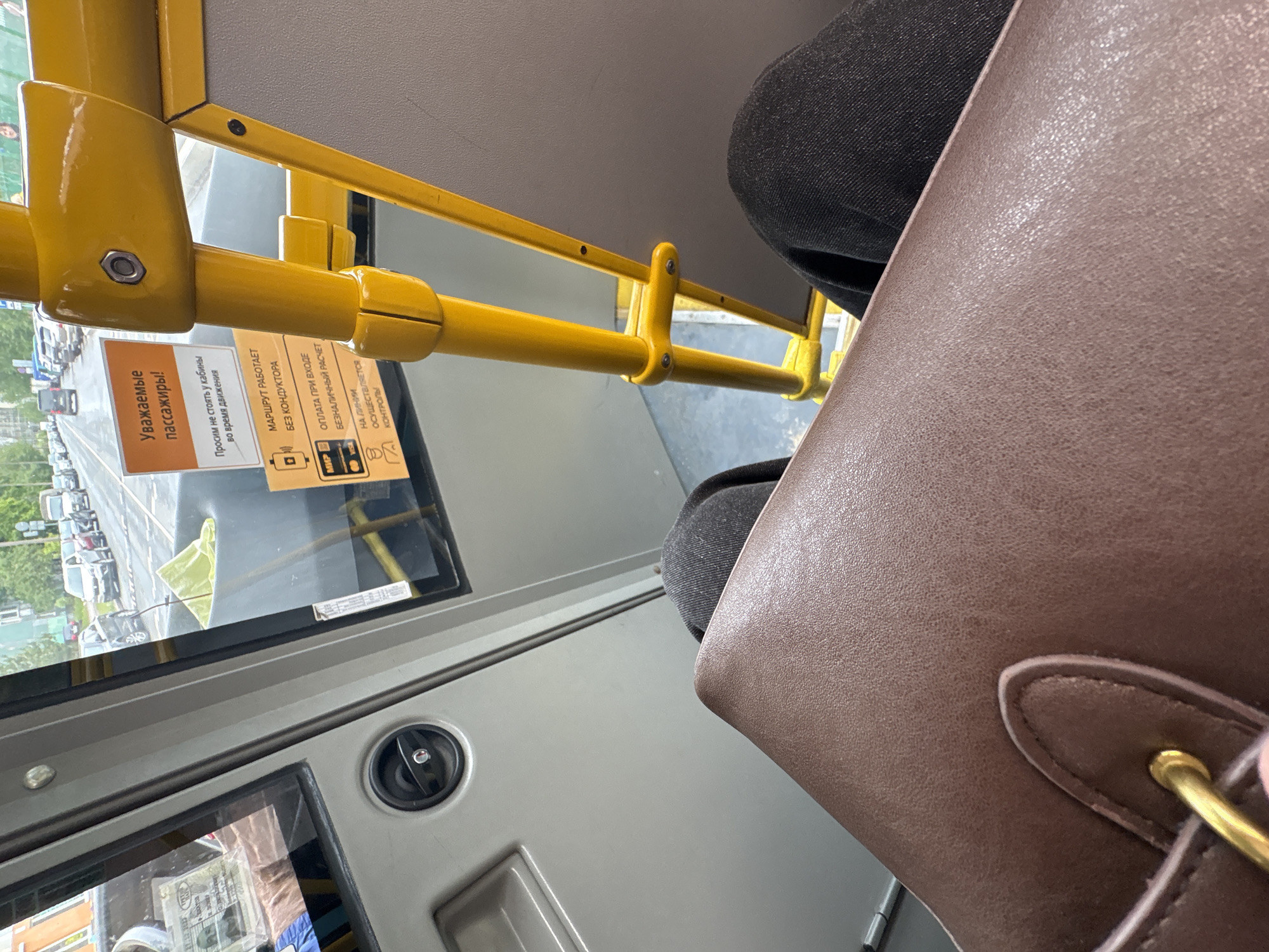 Passenger validates transit card on Saint Petersburg bus