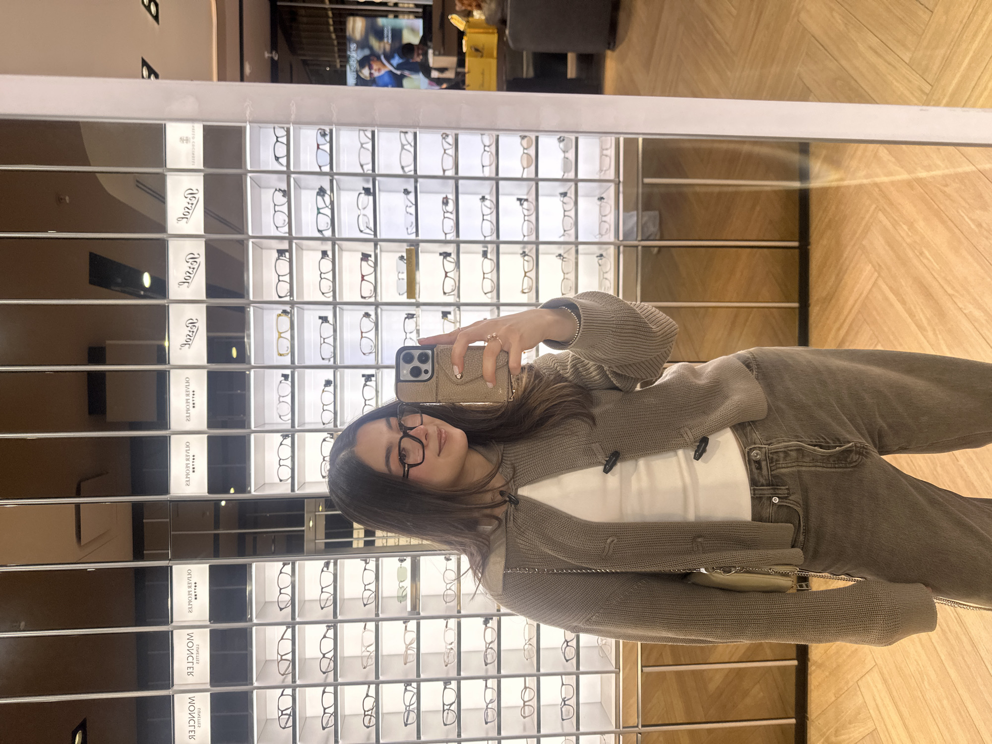 Woman takes late-night selfie at Mexico City eyeglass store