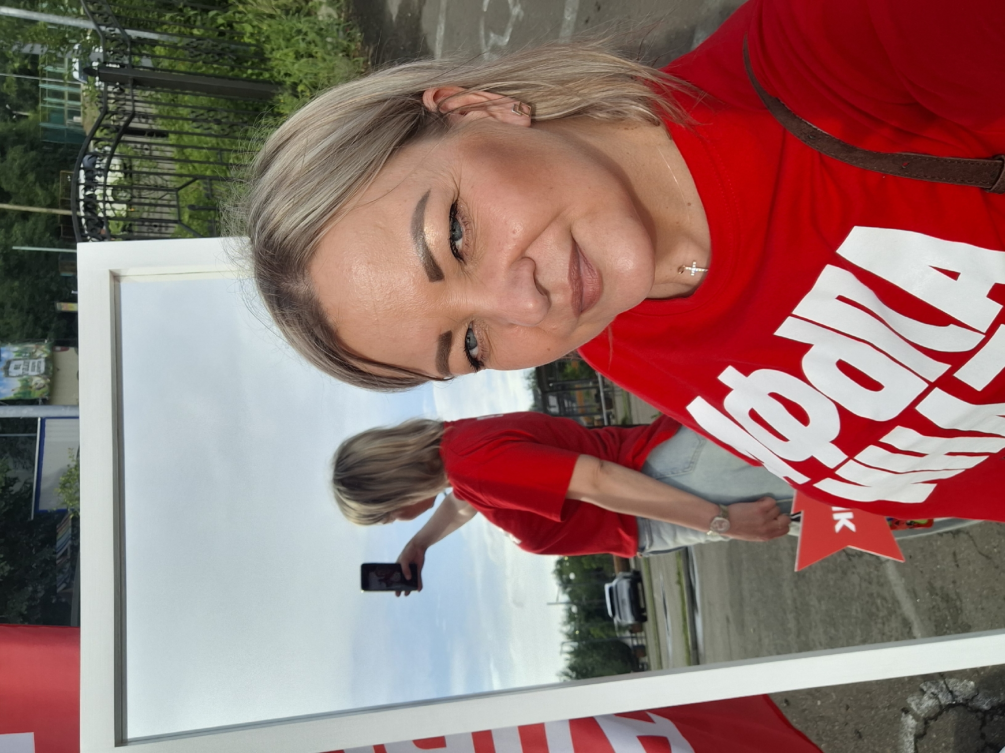 Woman documents Alpha Bank promotional event in Birobidzhan