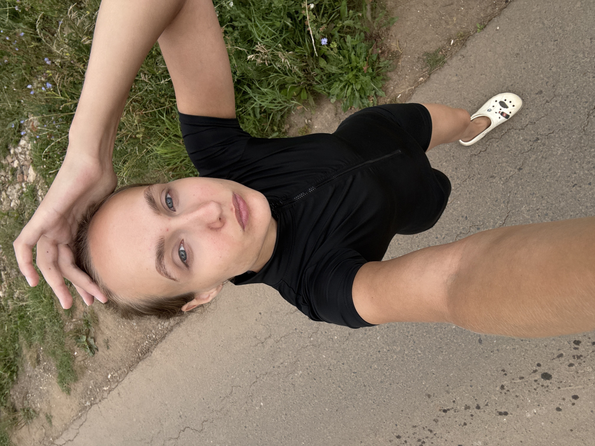 Roadside selfie session on a forested path in rural Russia