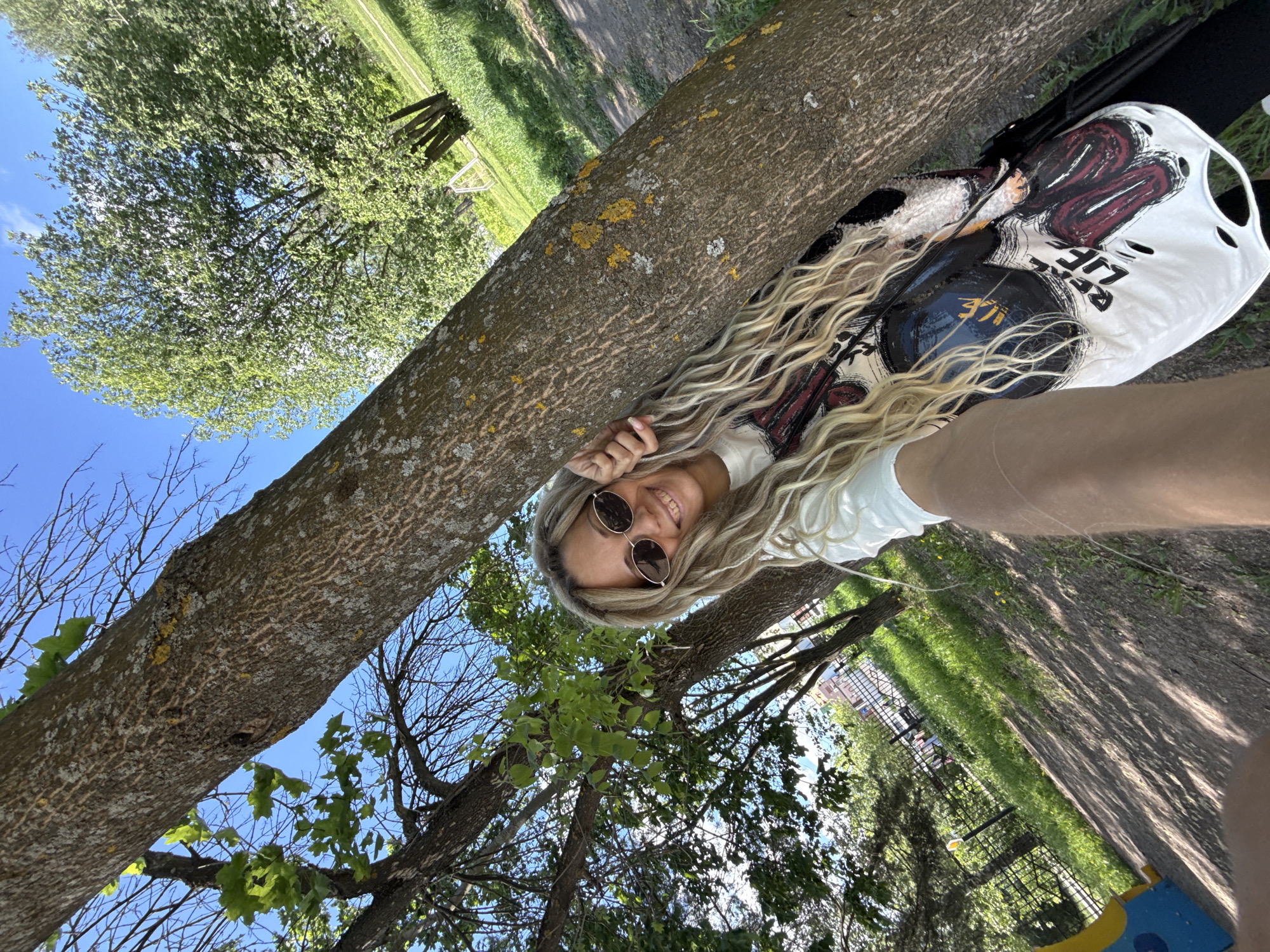 Woman photographed in casual moments in Rusanovo park and indoors