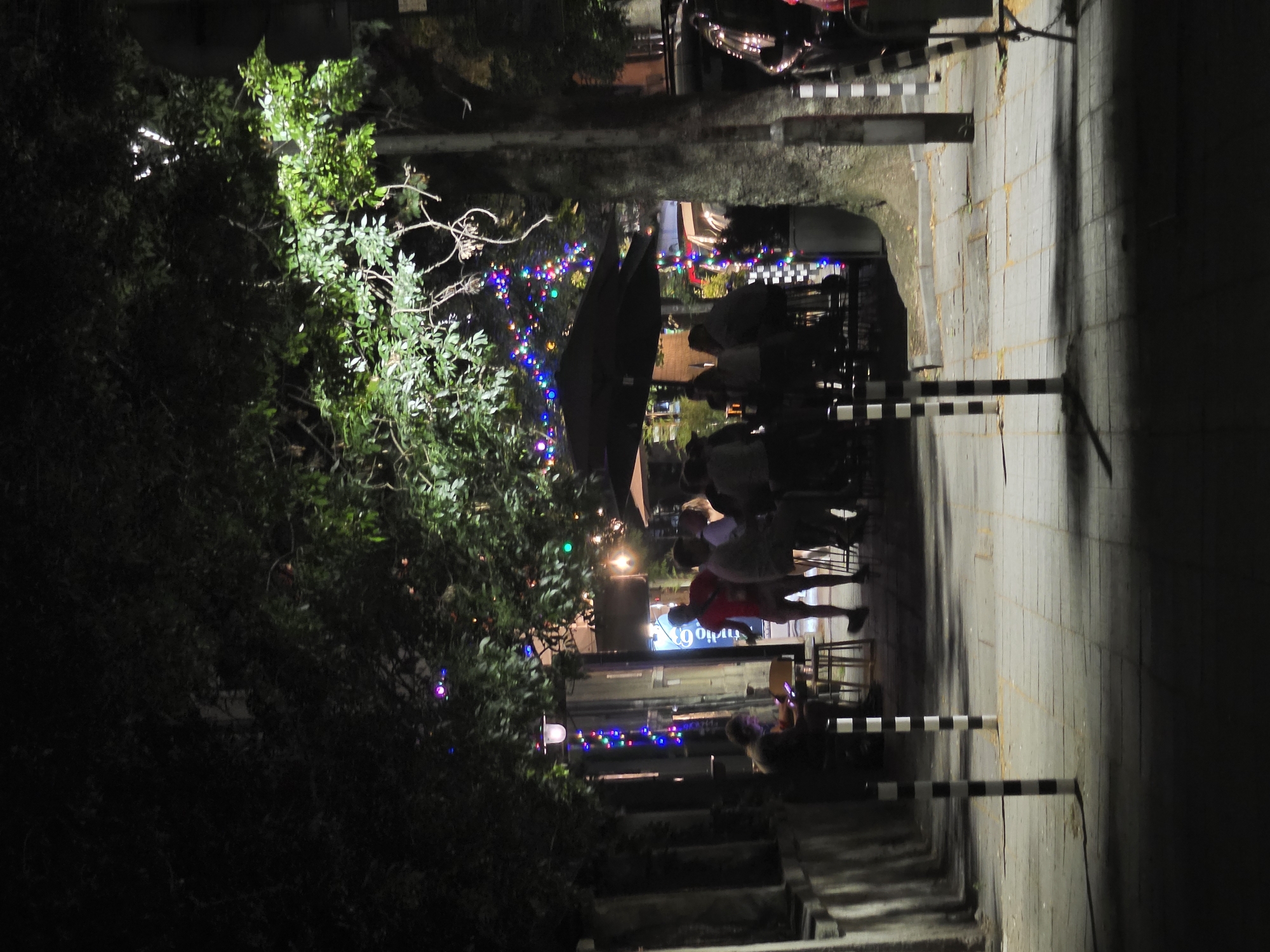 A quiet Sofia neighborhood at night, streets still wet from rain