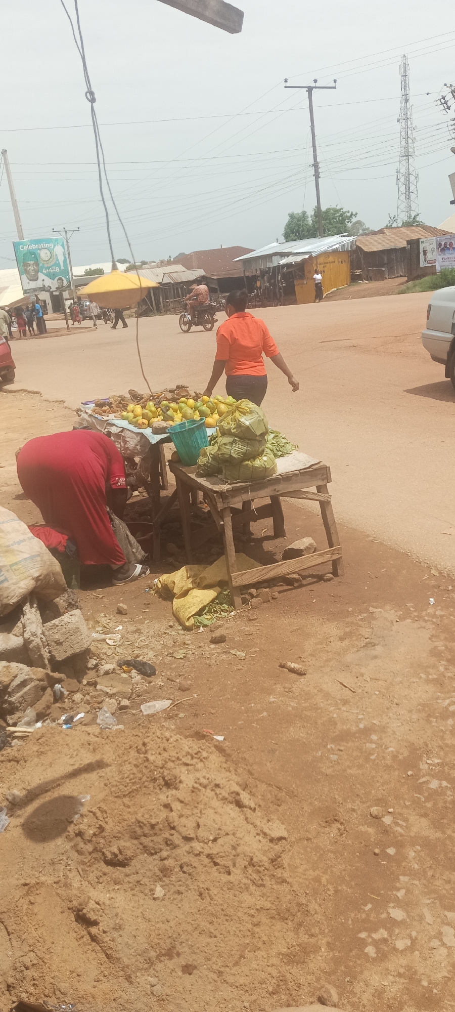Daily commerce documented at Nigerian market stalls and shops