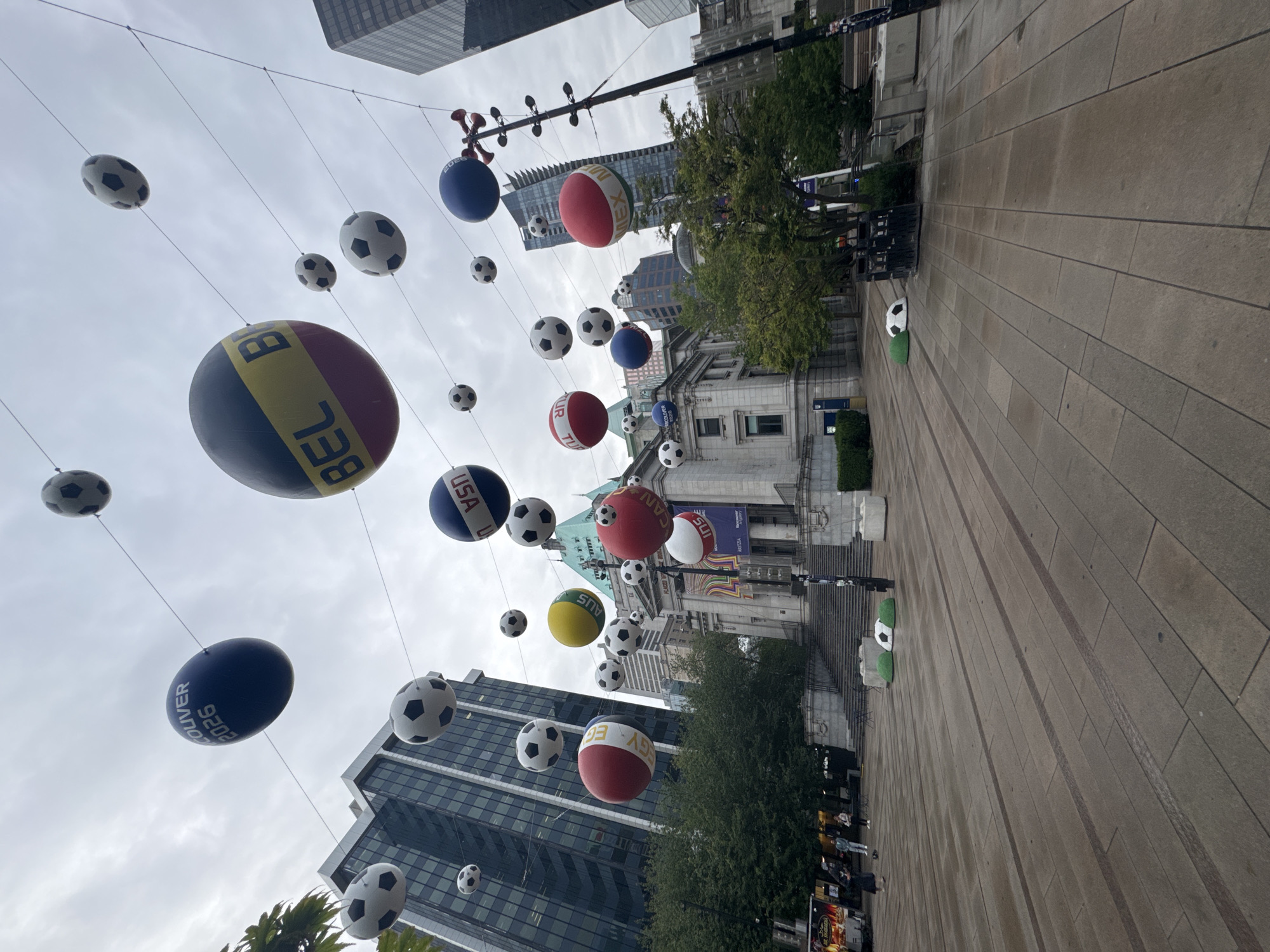 Downtown Vancouver plaza features giant suspended soccer ball decorations