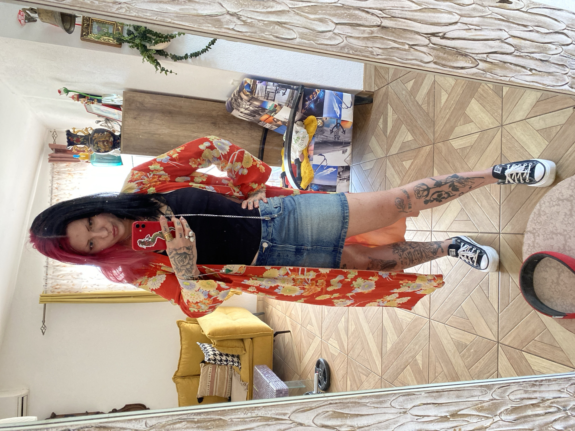 Woman takes selfies in floral kimono in Montenegro