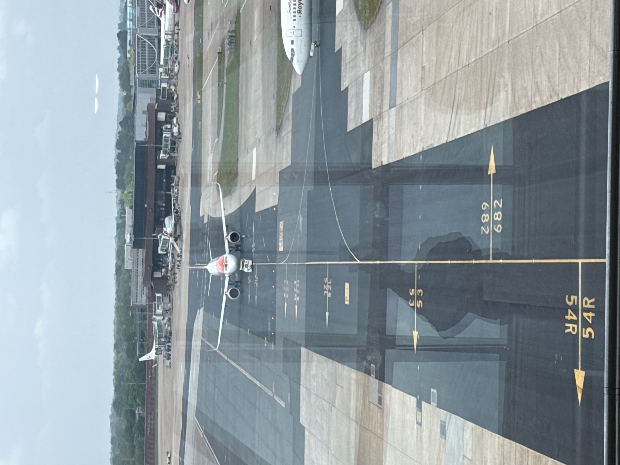Aircraft prepares for departure at Gatwick Airport runway