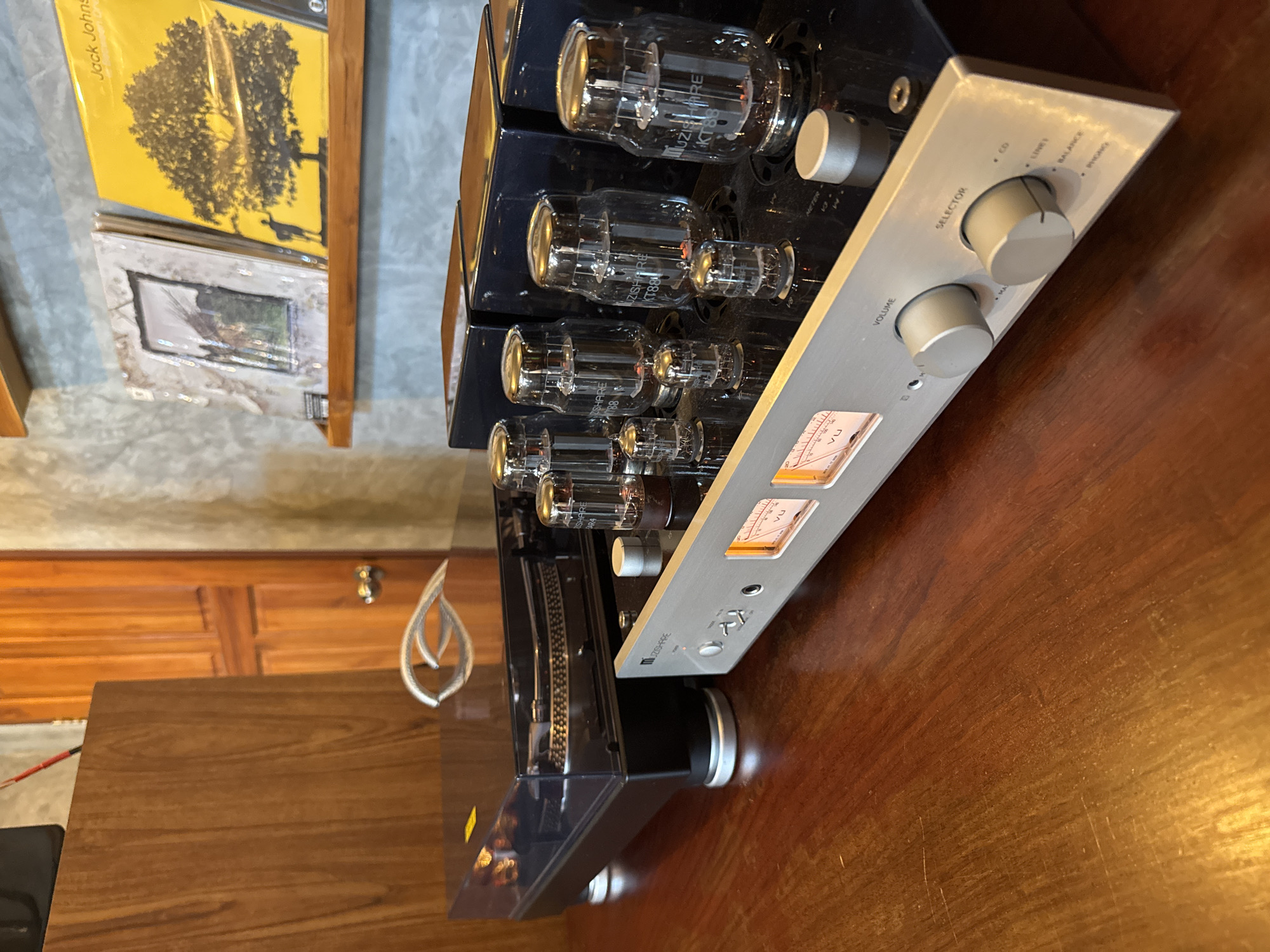 Morning documentation of home audio setup and tropical surroundings