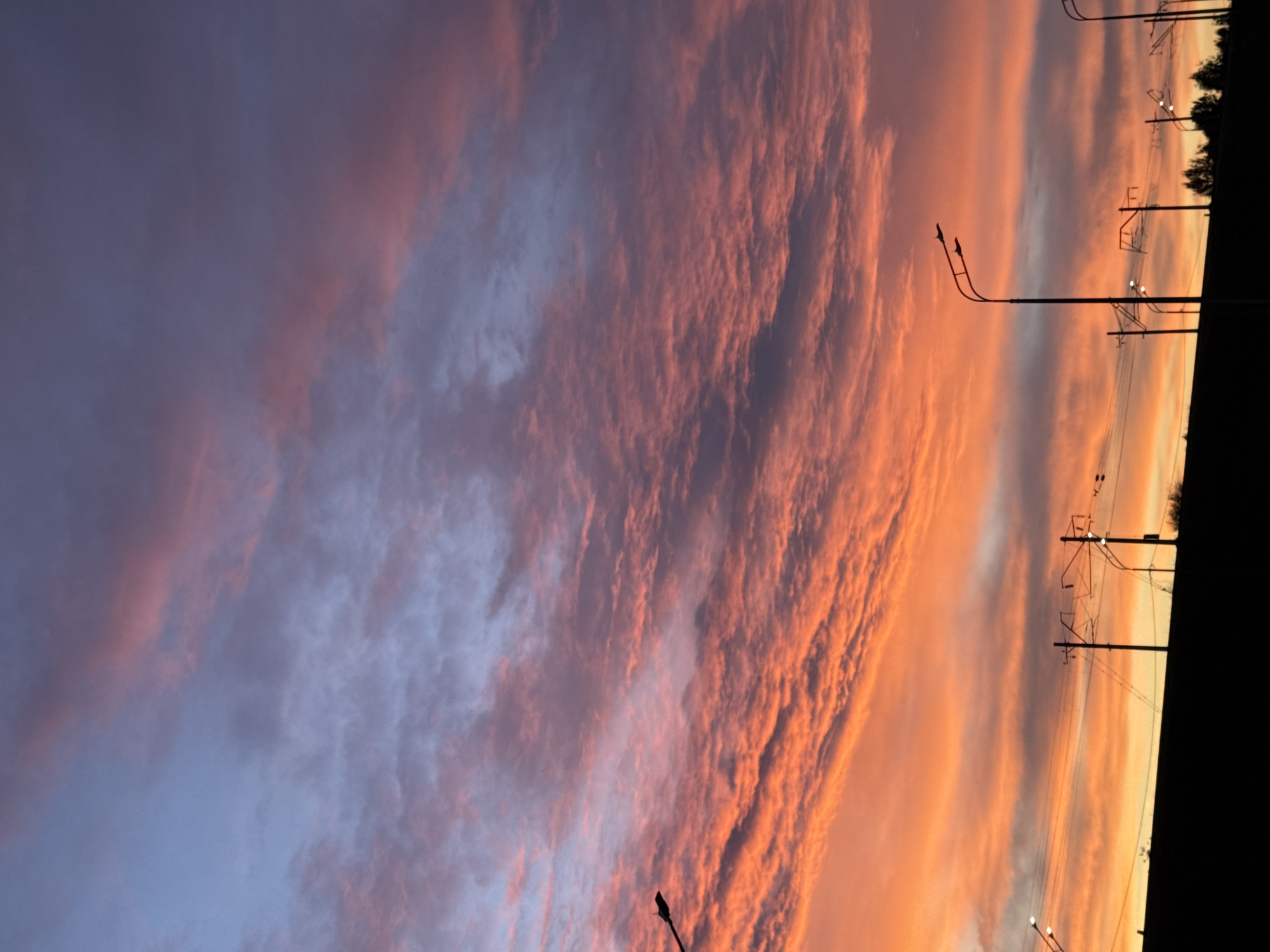 Vivid summer sunset blazes over Nizhny Novgorod skyline
