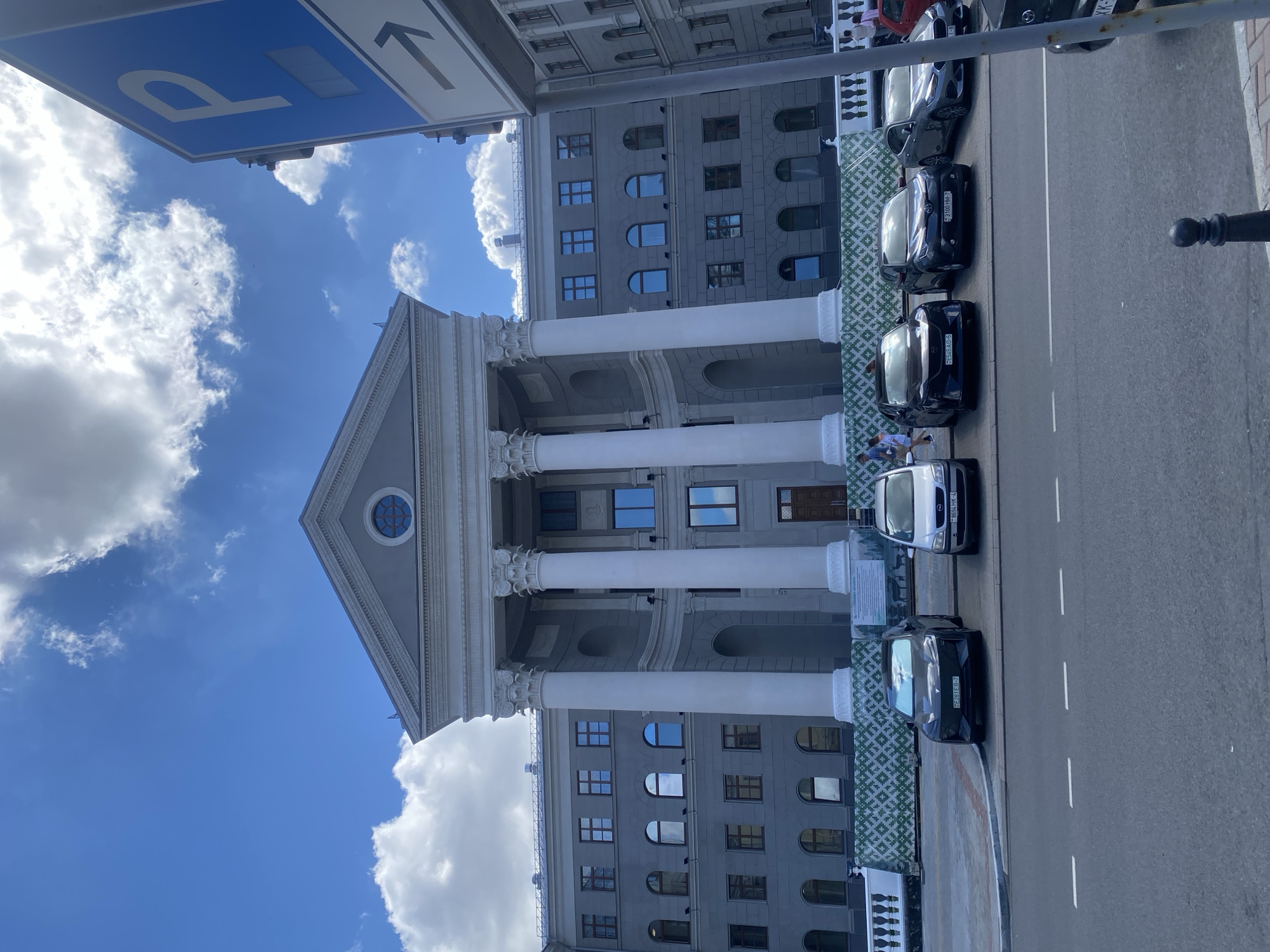 Landmarks, street art, and a vintage car in central Minsk