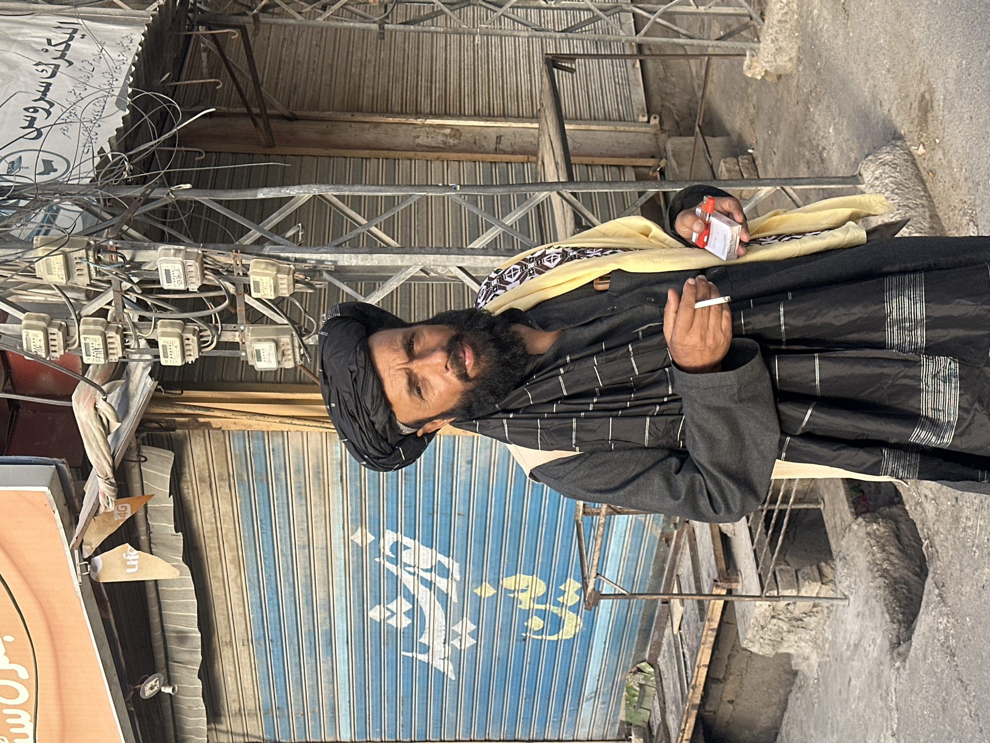 Man with turban spotted smoking on Quetta street