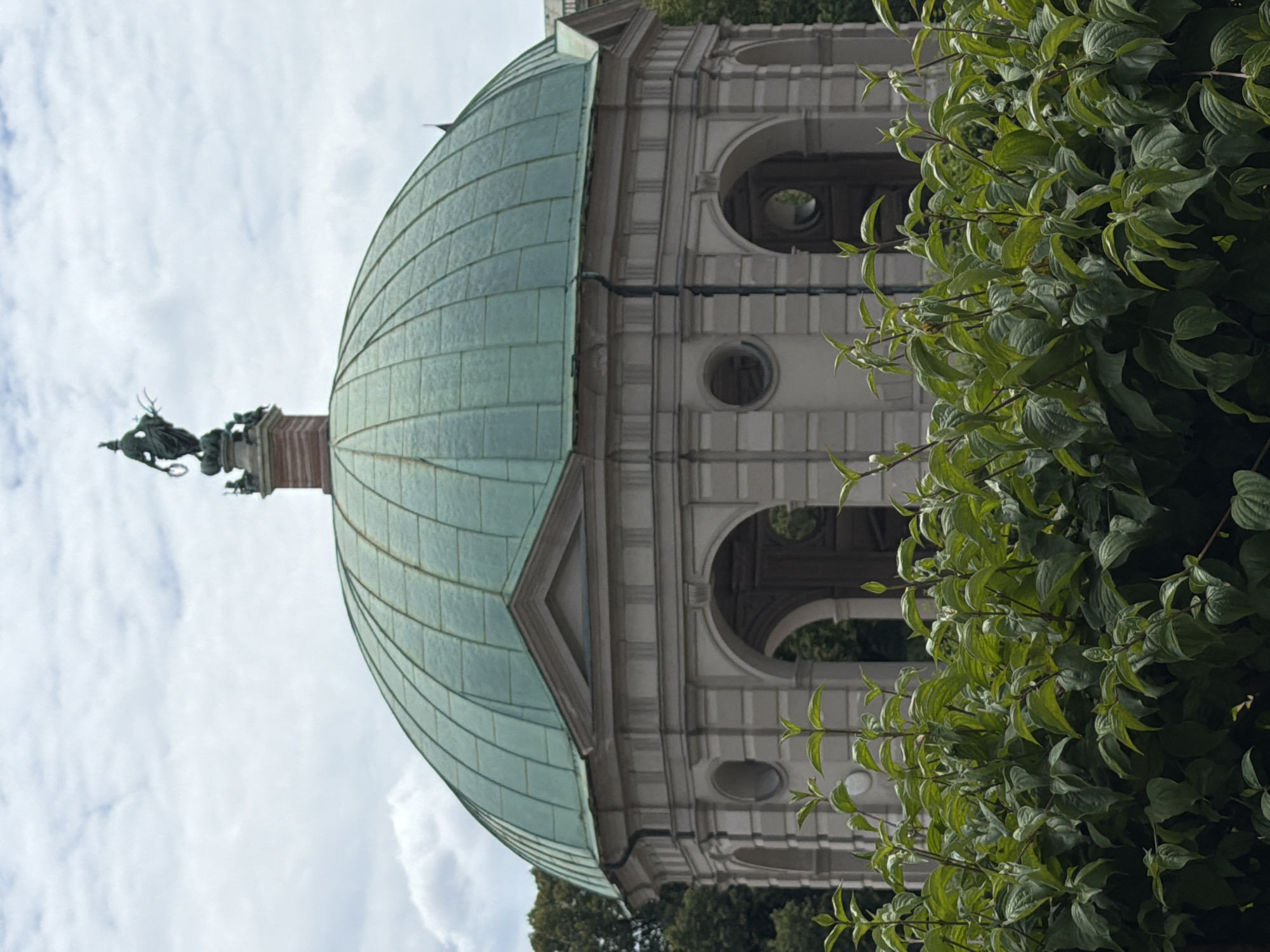 Munich skyline and Englischer Garten landmarks on a cloudy day
