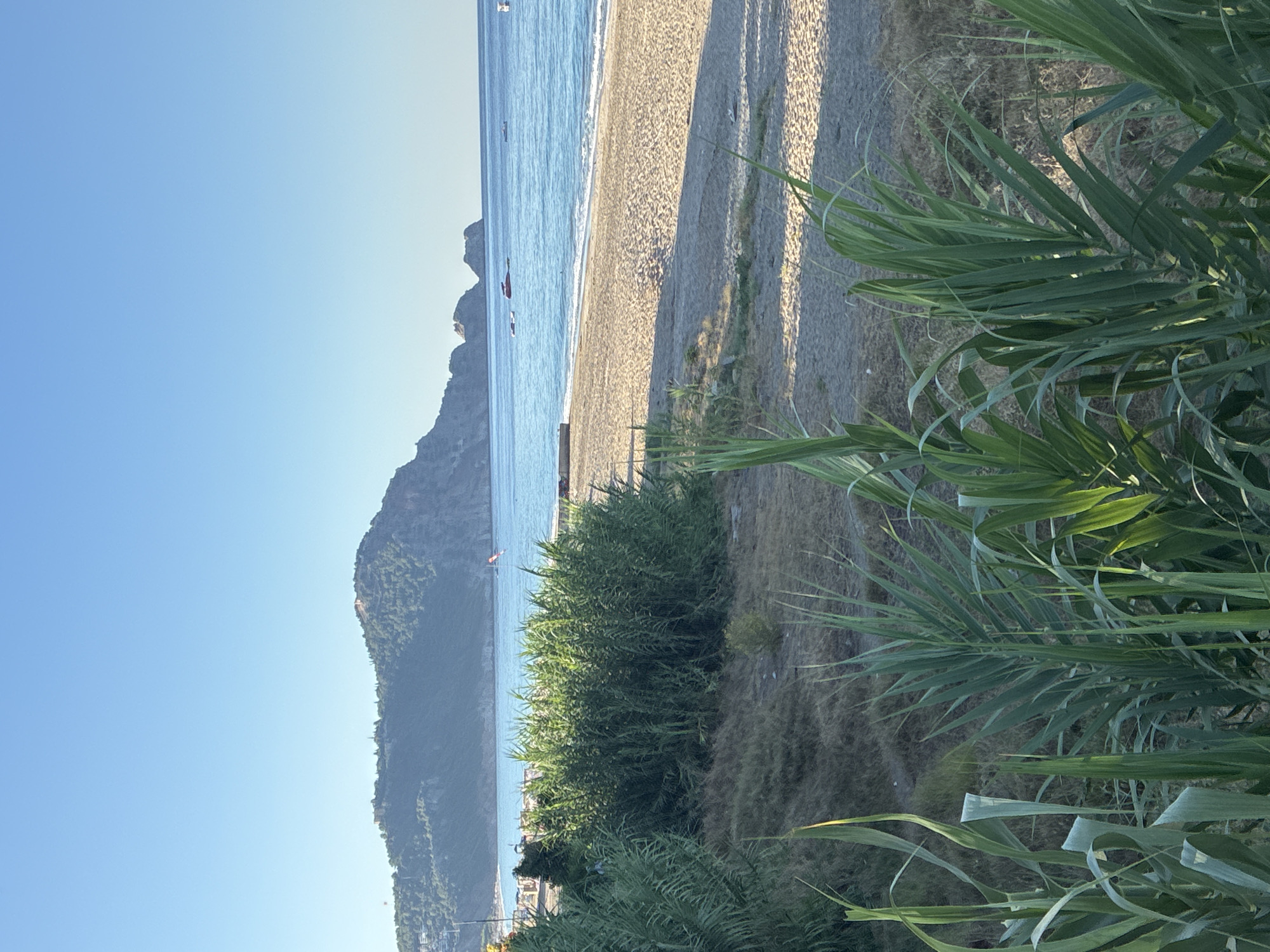 Beachfront morning in Alanya — shoreline, pools, and promenade life