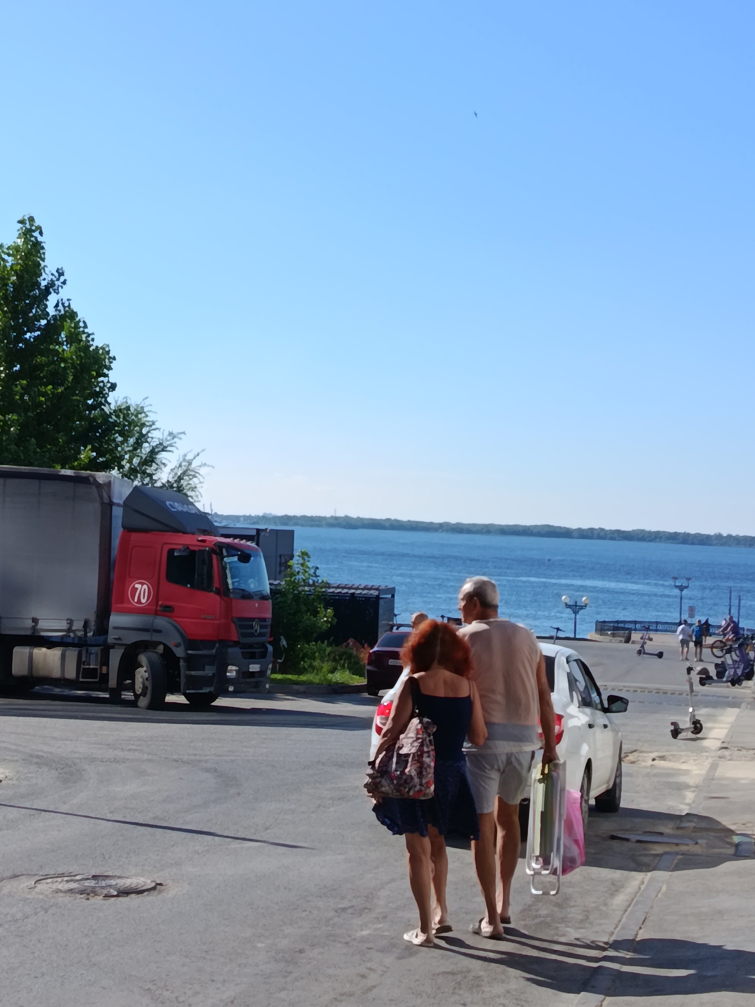 Summer morning along Saratov's Volga waterfront and city streets