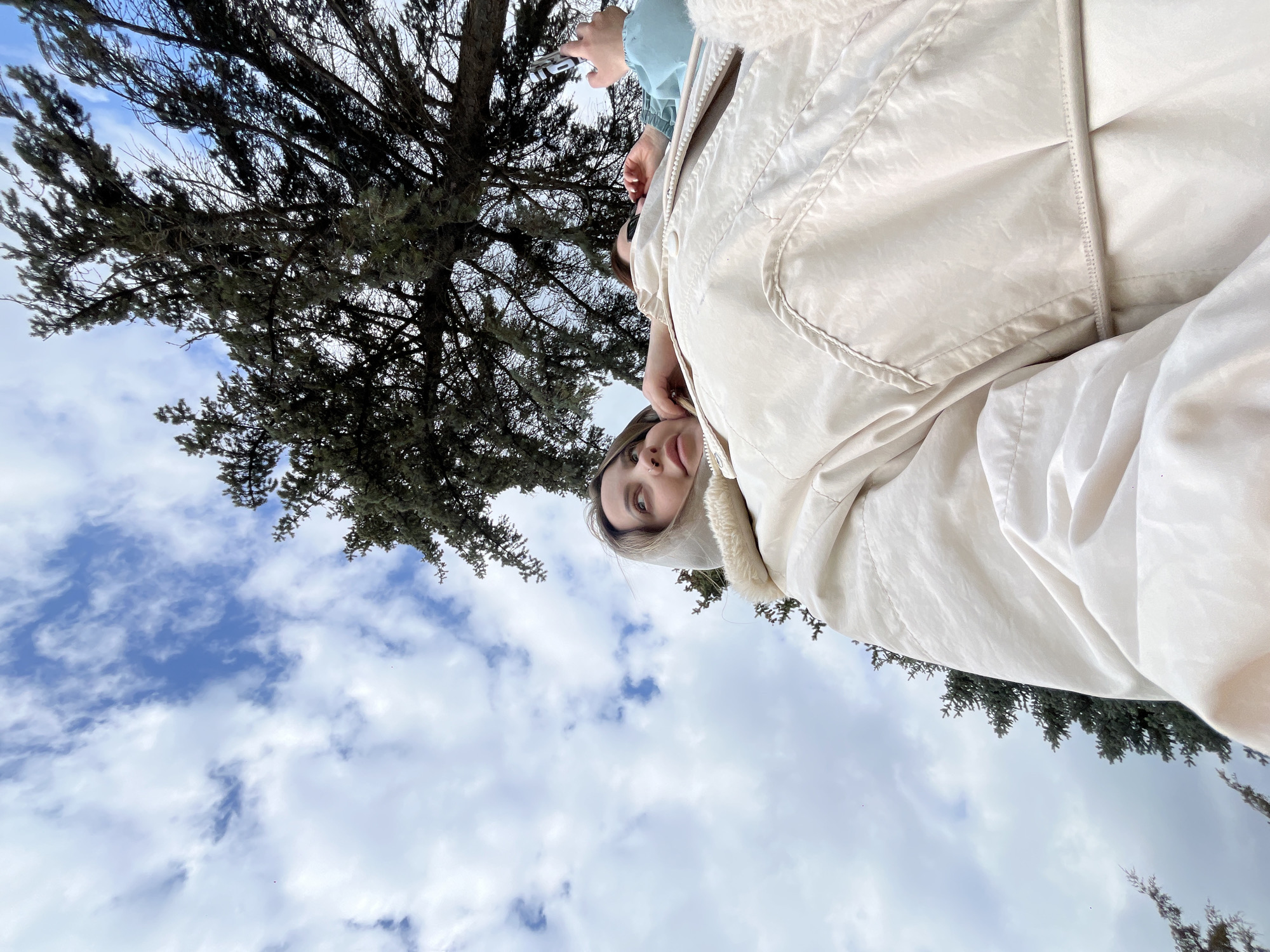 Friends take selfies outdoors in Russian village