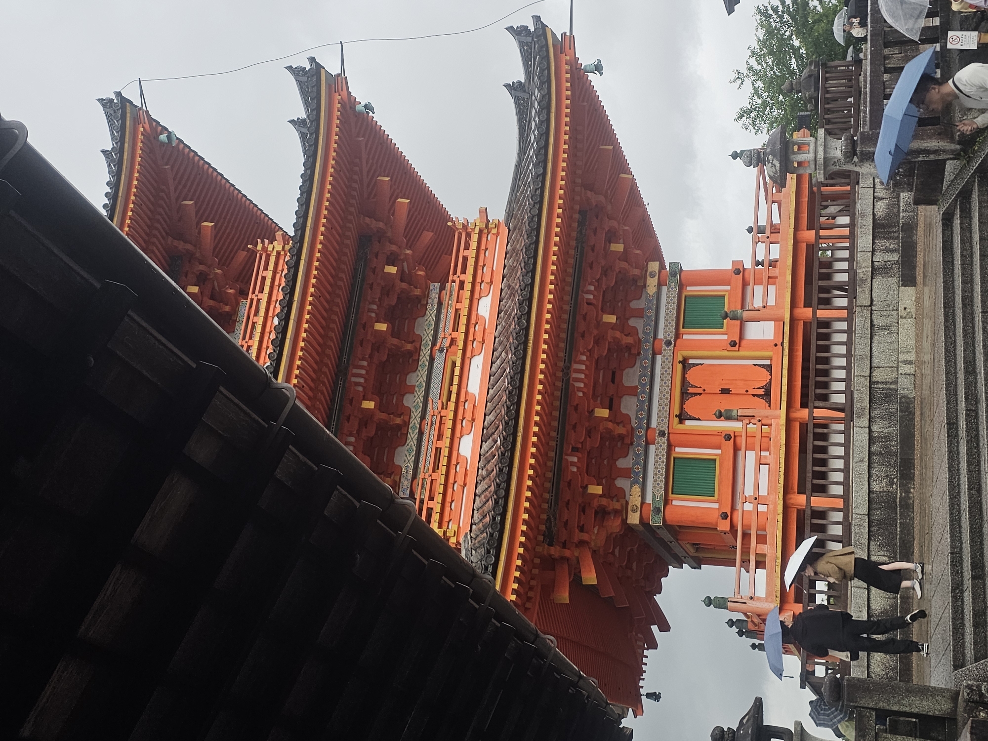 Morning view captures Kiyomizu-dera pagoda under gray Kyoto skies