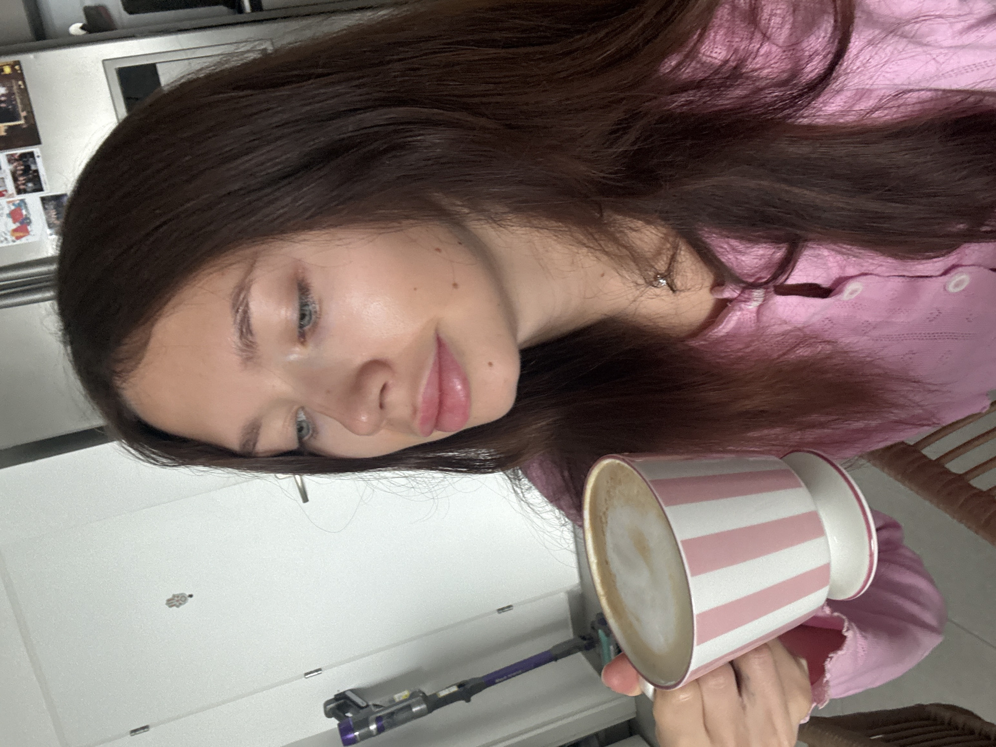 Woman enjoys breakfast with coffee and eggs in Ramat Gan