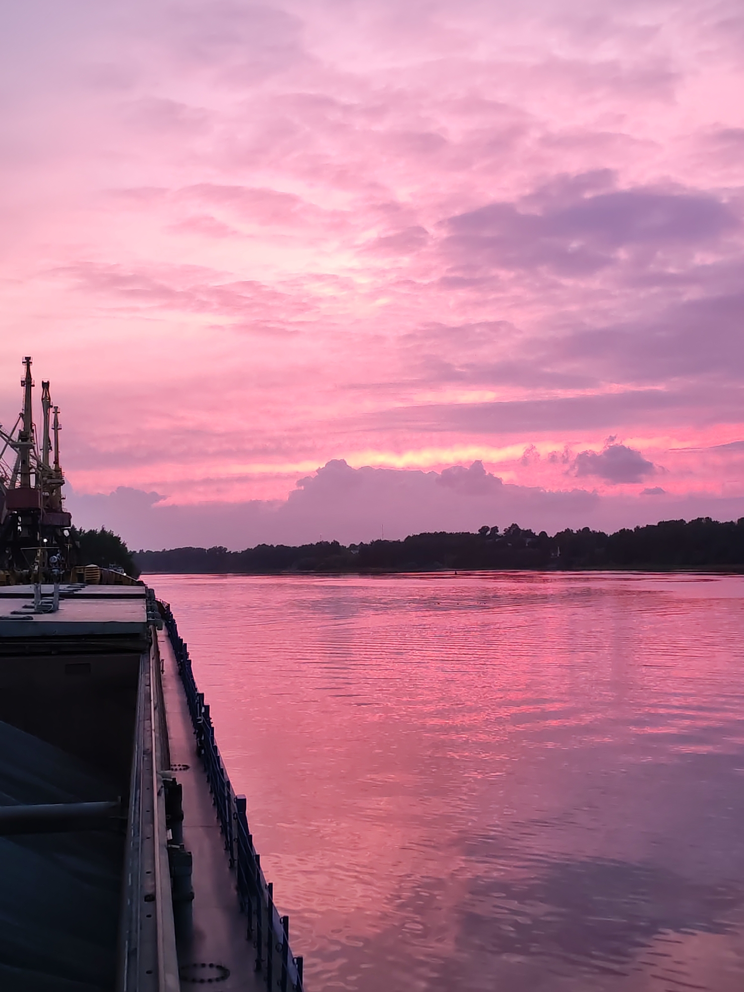 Evening scenes captured in Bol'shie Mkhi: grain elevator, river sunset
