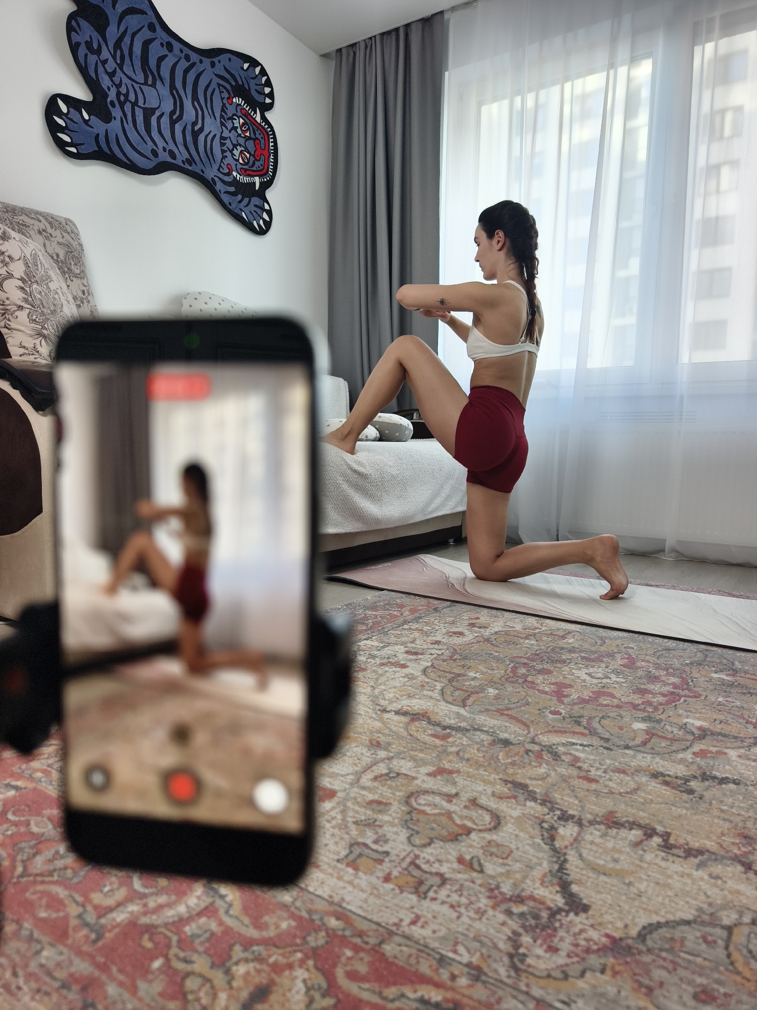 Woman records home yoga session in Tyumen apartment