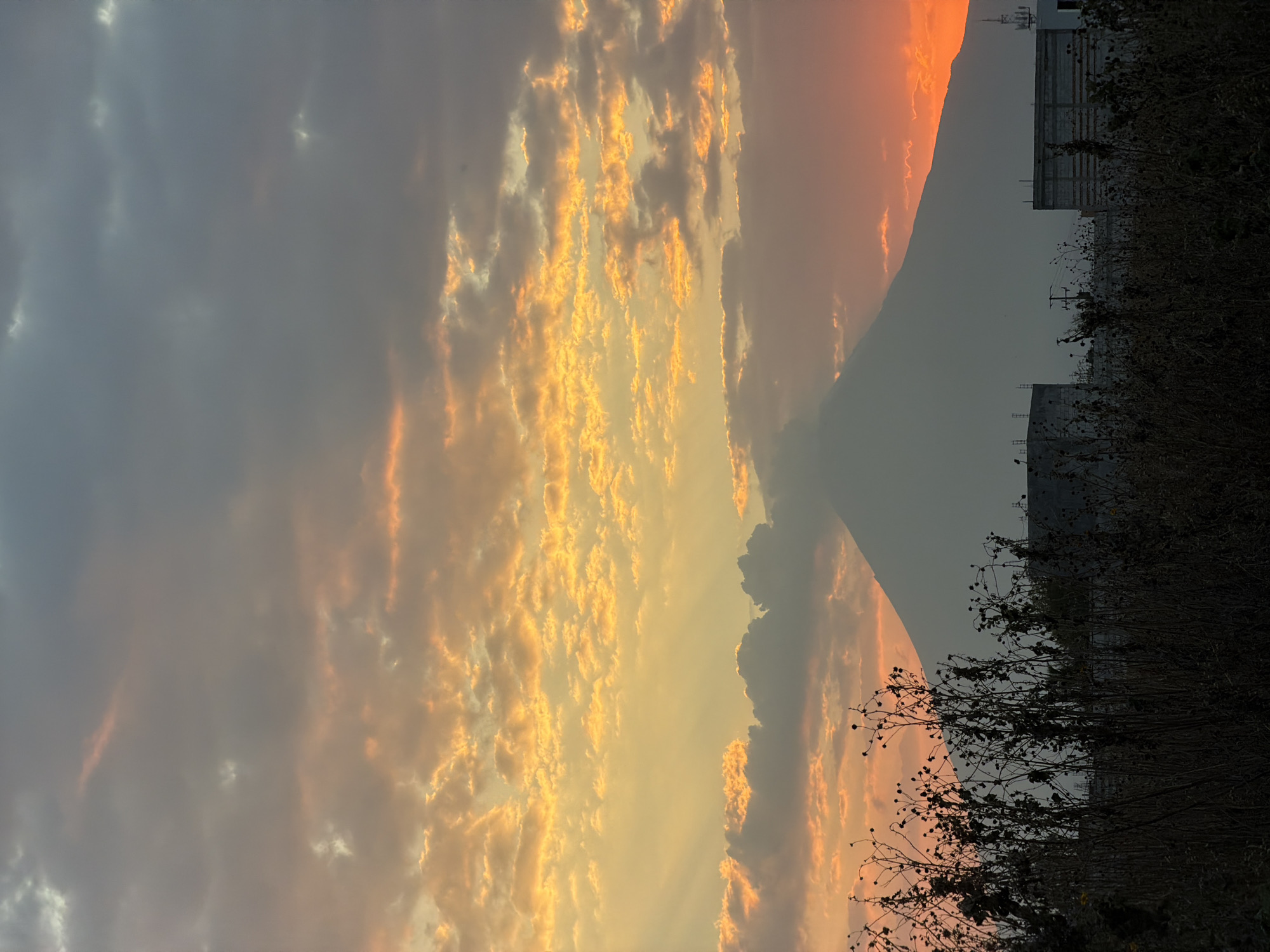 Sunrise/sunset scenes with volcano silhouette captured in San Andrés Cholula