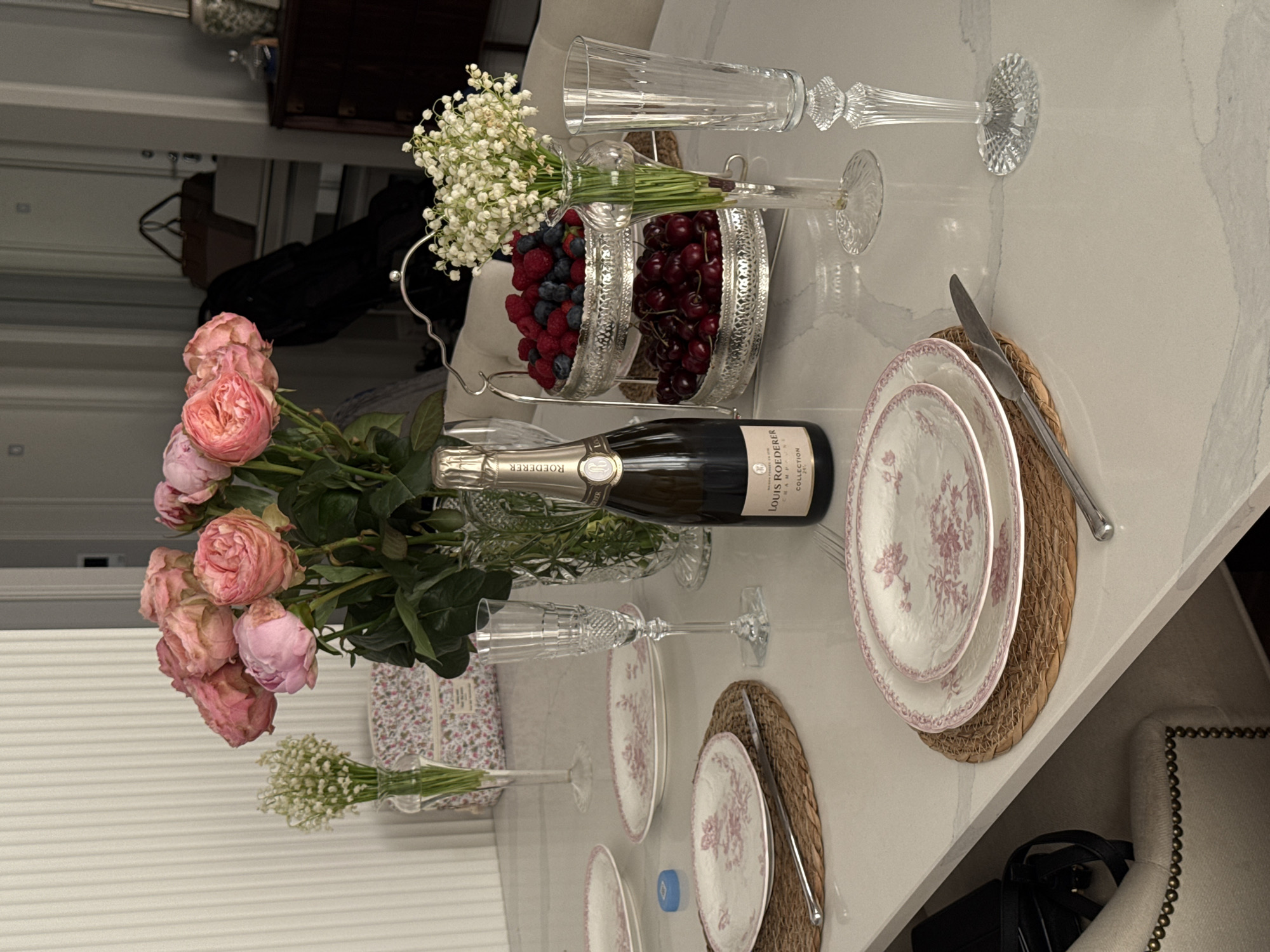 Elegant dinner party preparation captured in upscale Moscow home